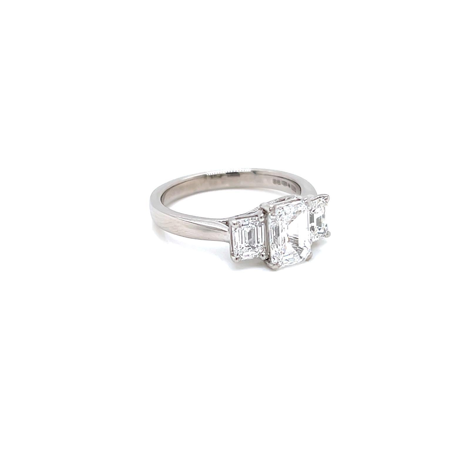 GIA Certified Three-Stone Emerald cut Diamond Ring in Platinum 

This elegant ring features three-stunning emerald-cut diamonds set in a sophisticated platinum band. The diamonds have a total weight of 2.50 carats and are of E colour and SI2