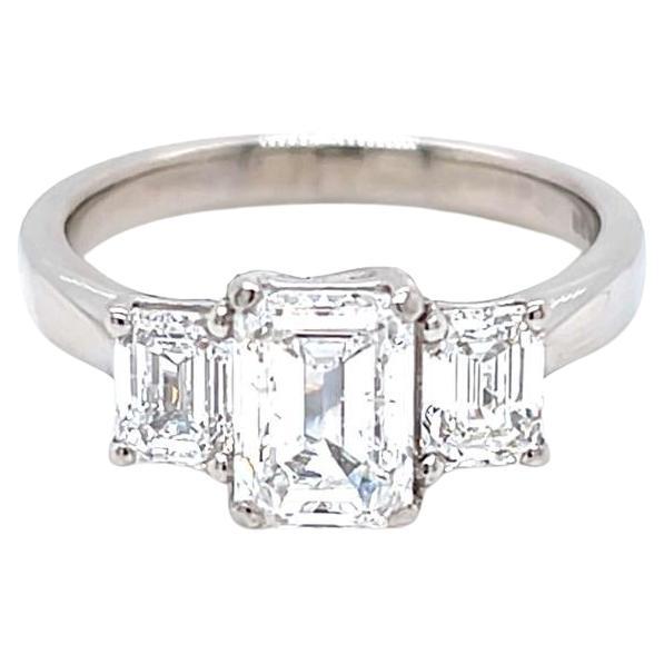 GIA Certified Three-Stone Emerald cut Diamond Ring in Platinum