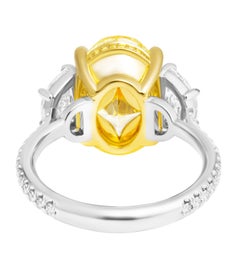 GIA Certified Three-Stone Ring with 6.02ct Fancy Light Yellow VS1 Oval