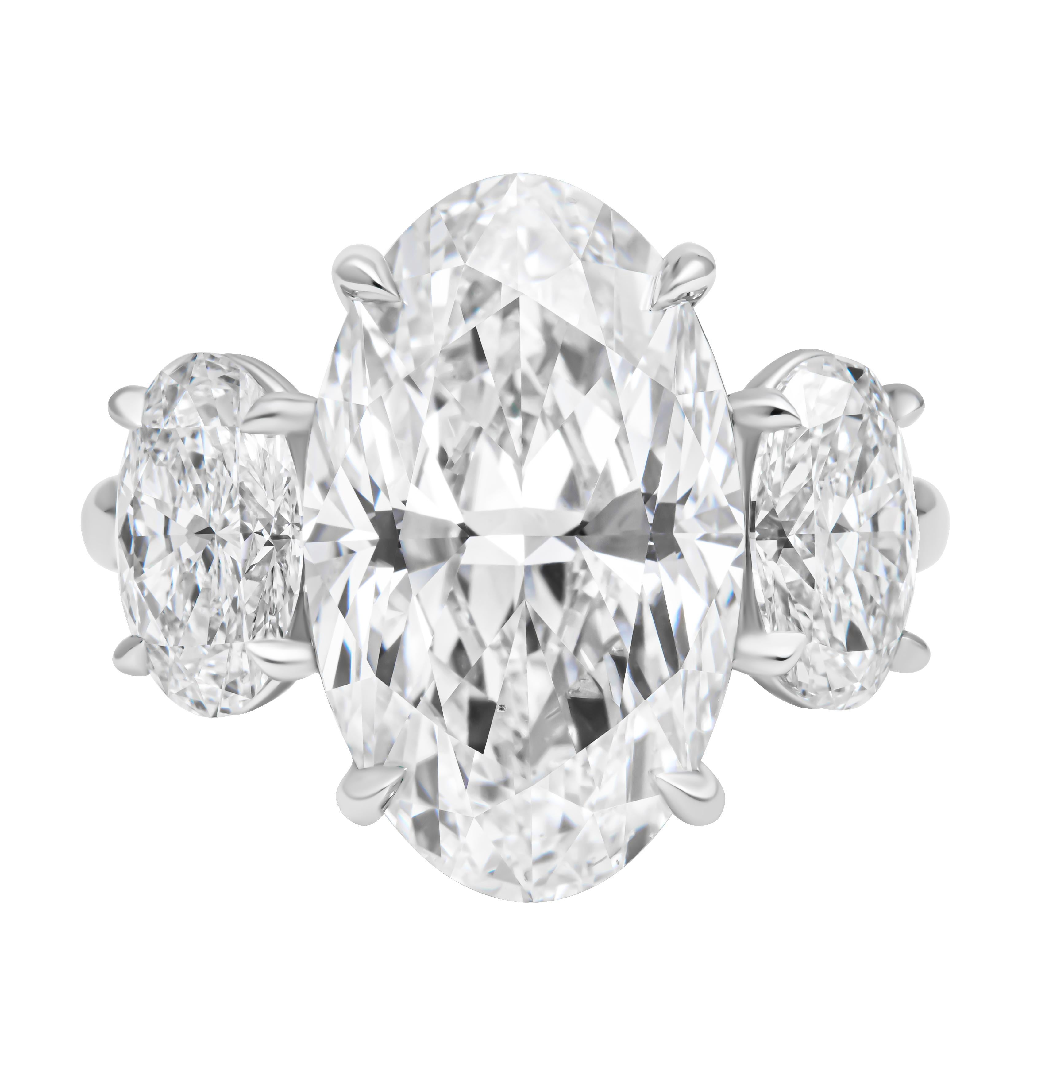 GIA Certified Three Stone Ring with 8.01ct G SI1 Oval Diamond
Three-stone ring featuring a 2.3mm oval-profile shank with an oval center and oval side stones, crafted in platinum (PT950)
Center Stone:  8.01CT Oval G SI1 GIA# 5221115388 

Sides:   