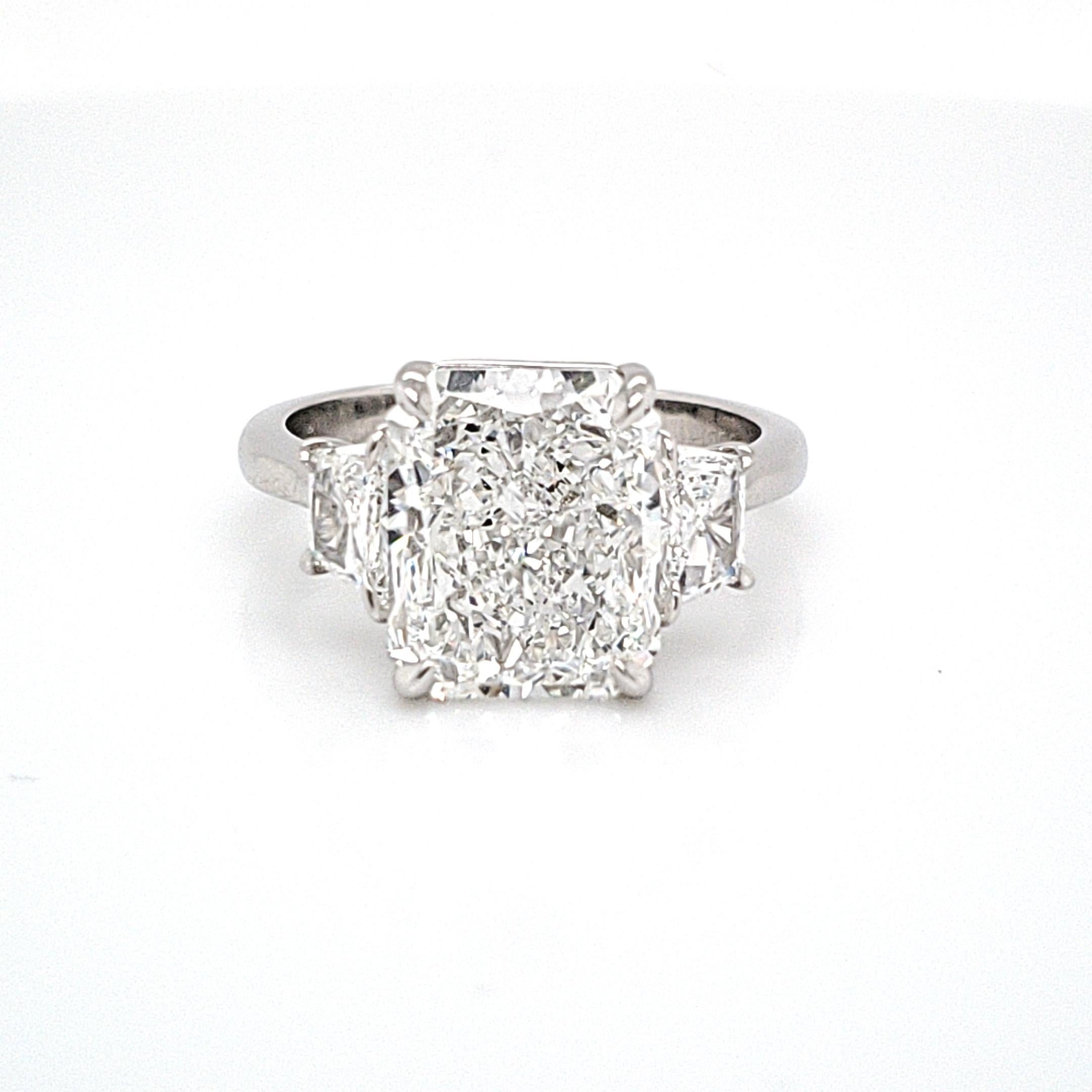 Women's GIA Certified Three-Stone Ring with a 4.40 Carat Radiant Cut Center