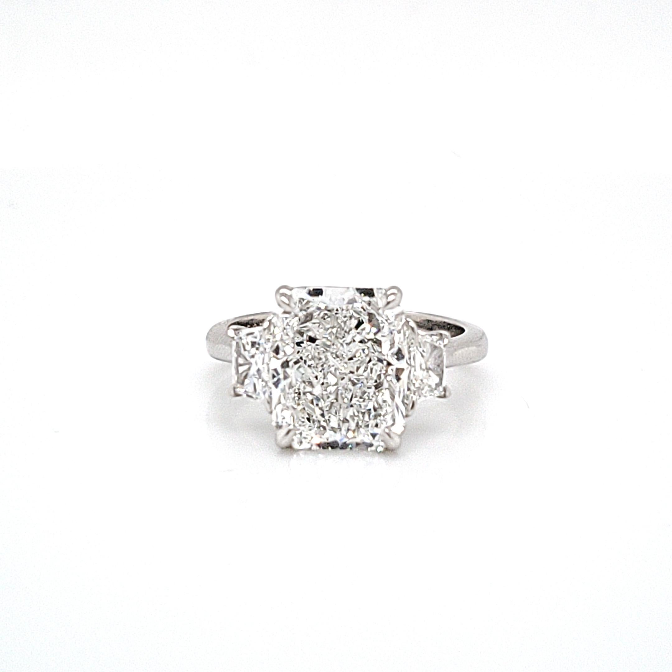GIA Certified Three-Stone Ring with a 4.40 Carat Radiant Cut Center 1