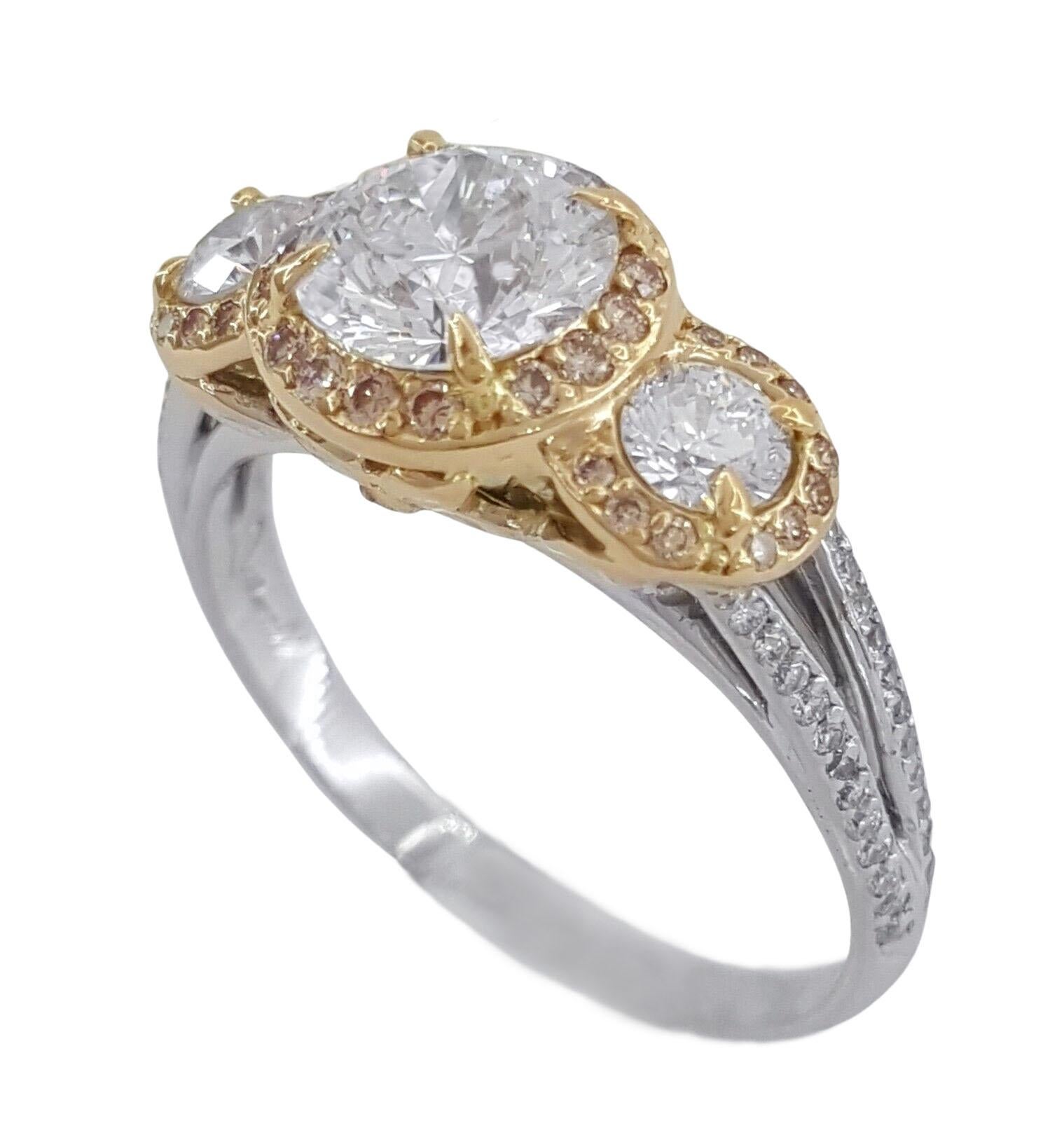 Three Stone Platinum & 18K Rose Gold Forever 10 Diamond Engagement Halo Ring.



The ring weighs 5.2 grams, size 7.25, the center stone is a Forever 10 Round Brilliant Cut Diamond weighing 1.04 ct, I in color, SI1 in clarity, measurements of the
