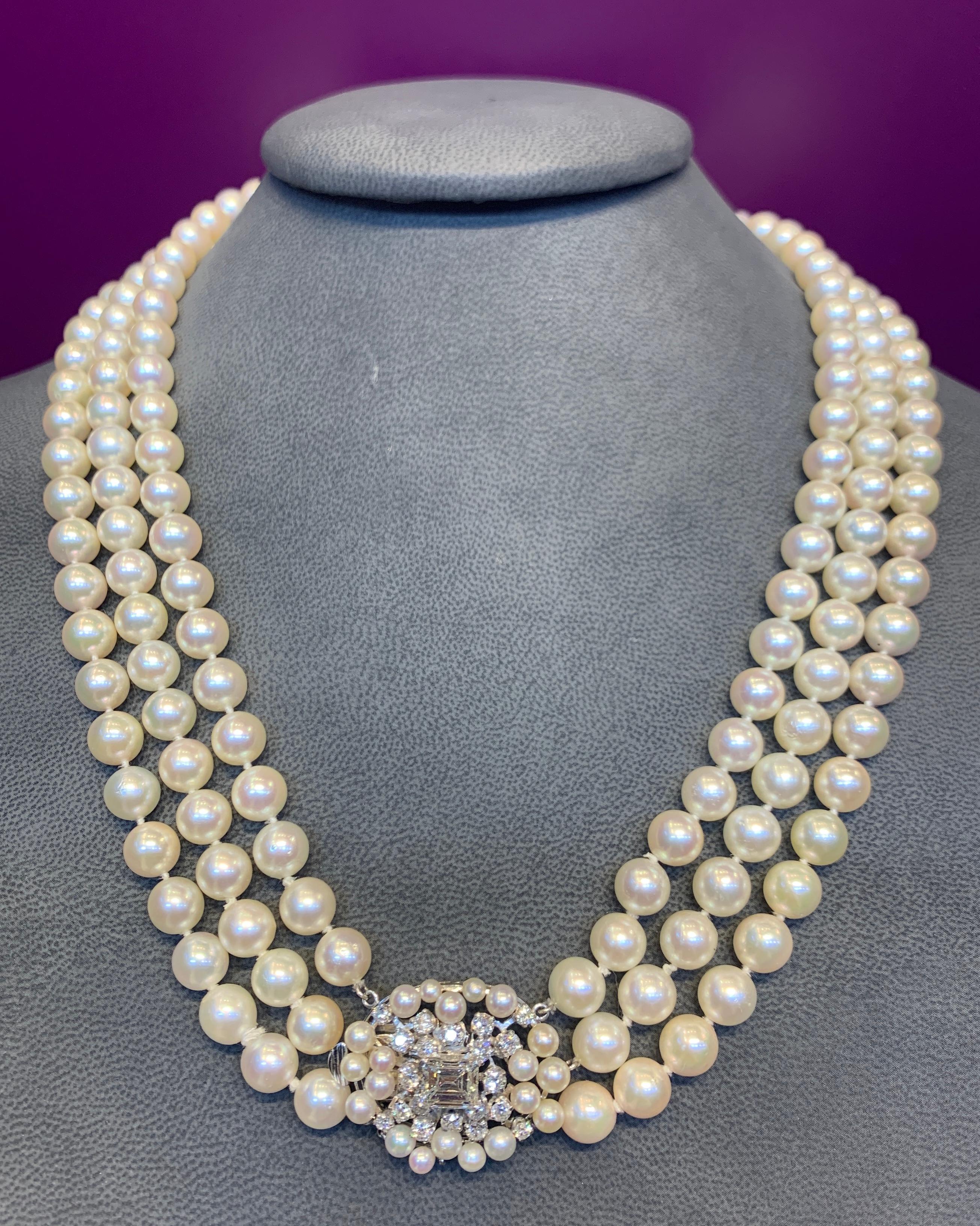 three strand pearl necklace with brooch