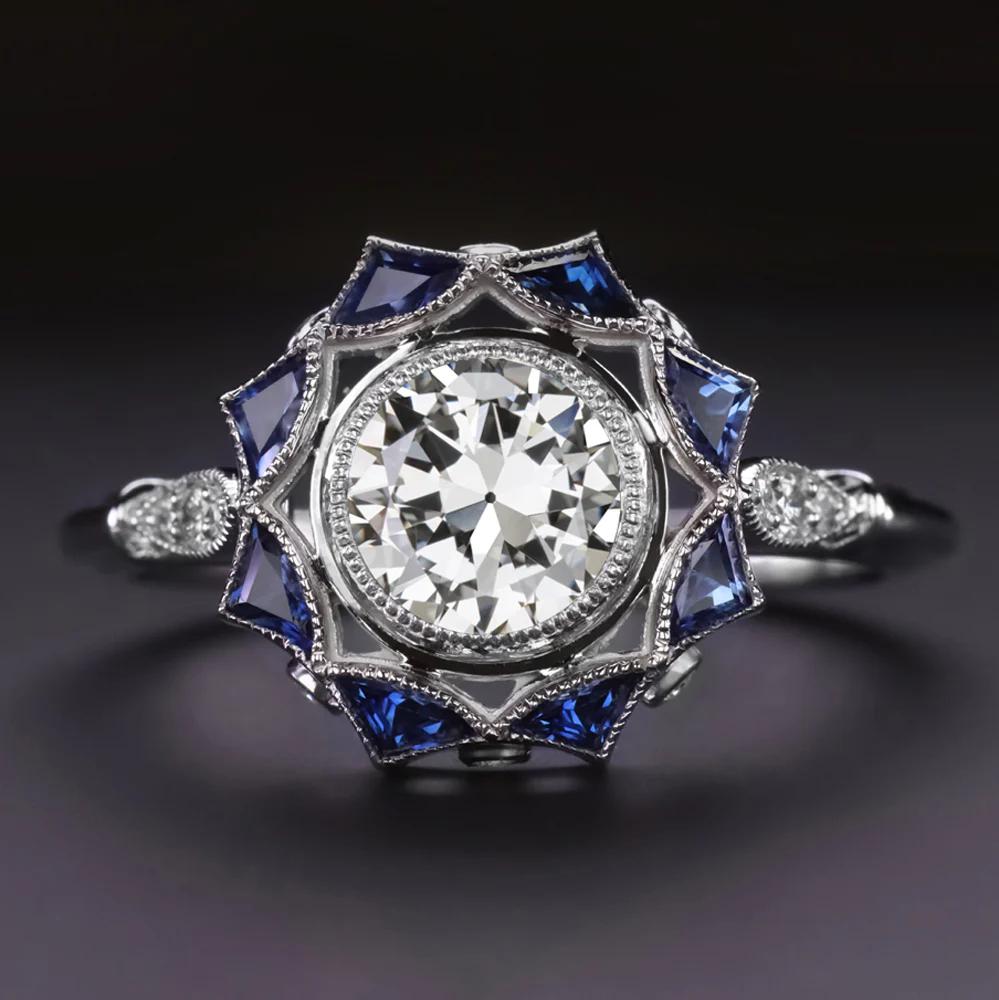 GIA-zertifizierter Diamant & Saphir im Übergangsschliff Fächer-Halo-Ring aus Weißgold