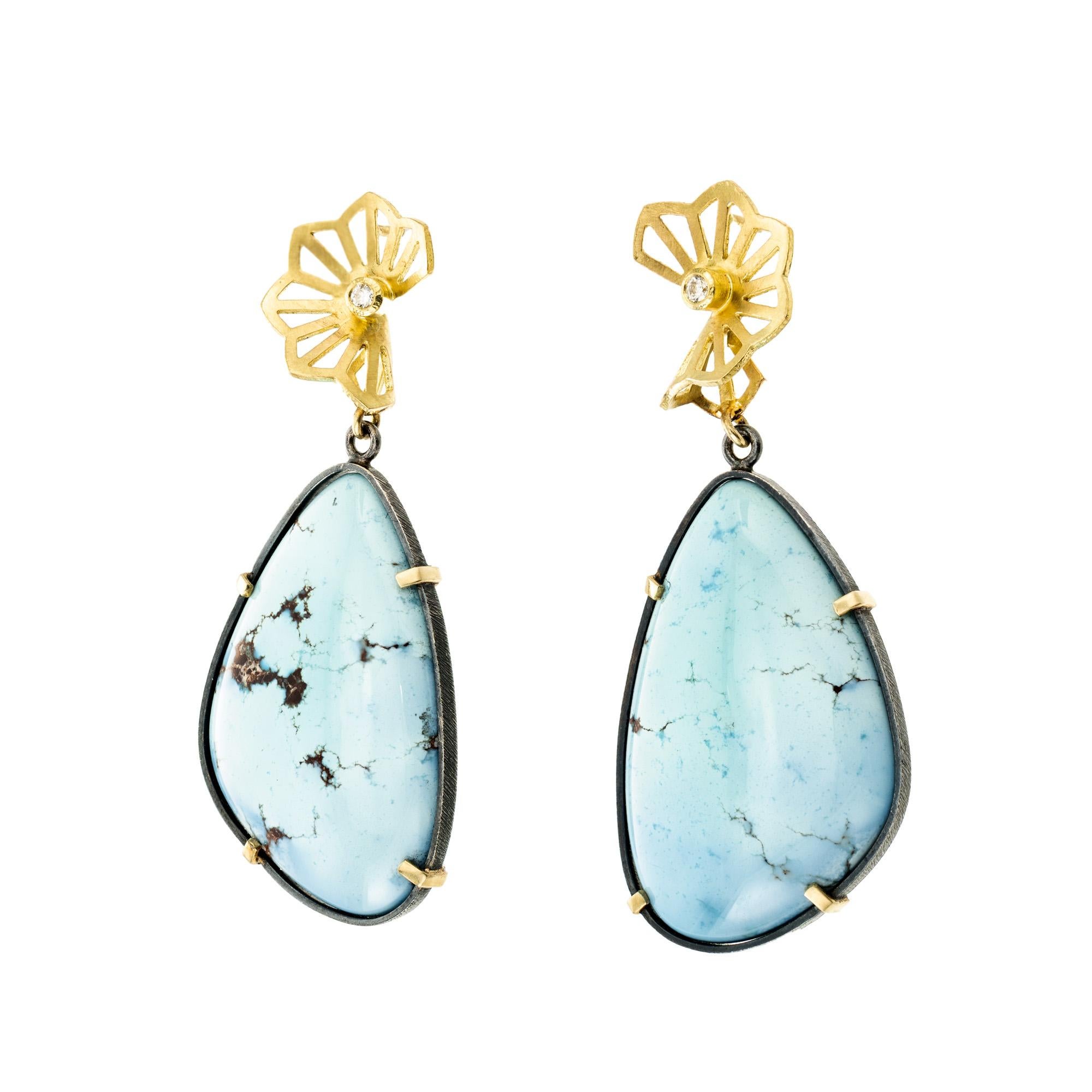 One of a kind pair of natural GIA certified light blue turquoise in handmade designer style earrings. These earrings have 2 freeform cabochon light blue turquoise in silver frames accented by 2 round brilliant cut diamonds mounted on the upper fan