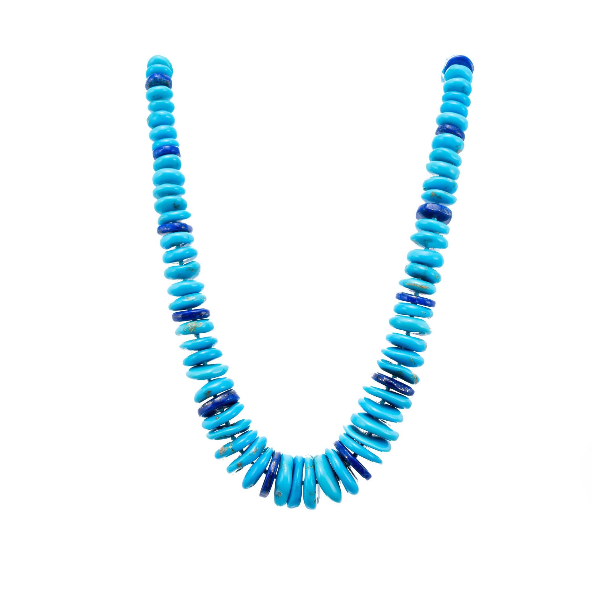 GIA certified turquoise and lapis necklace with 18k yellow gold catch. Graduated rondelle beads from 9.5 to 18.8mm. 19 inches. 

79 round greenish blue disc rondelle turquoise beads 9.7-18.9mm GIA Certificate # 2203127587
14 round disc rondelle dark