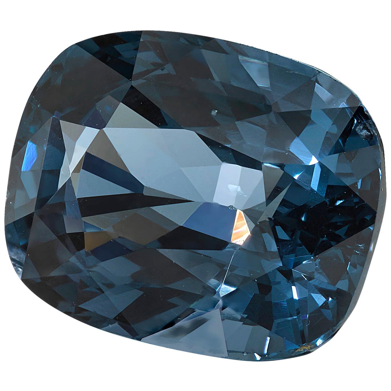 This pretty blue spinel cushion weighs 4.90 carats and would make a beautiful 3-stone ring, though its shape lends itself to a variety of possibilities! It measures 11.13 x 8.86 x 6.10 millimeters, is clean, brilliant, and well-faceted, exhibiting