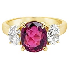 GIA-zertifizierter Ring aus Gelbgold mit drei Steinen, unerhitzter Rubin und Diamant