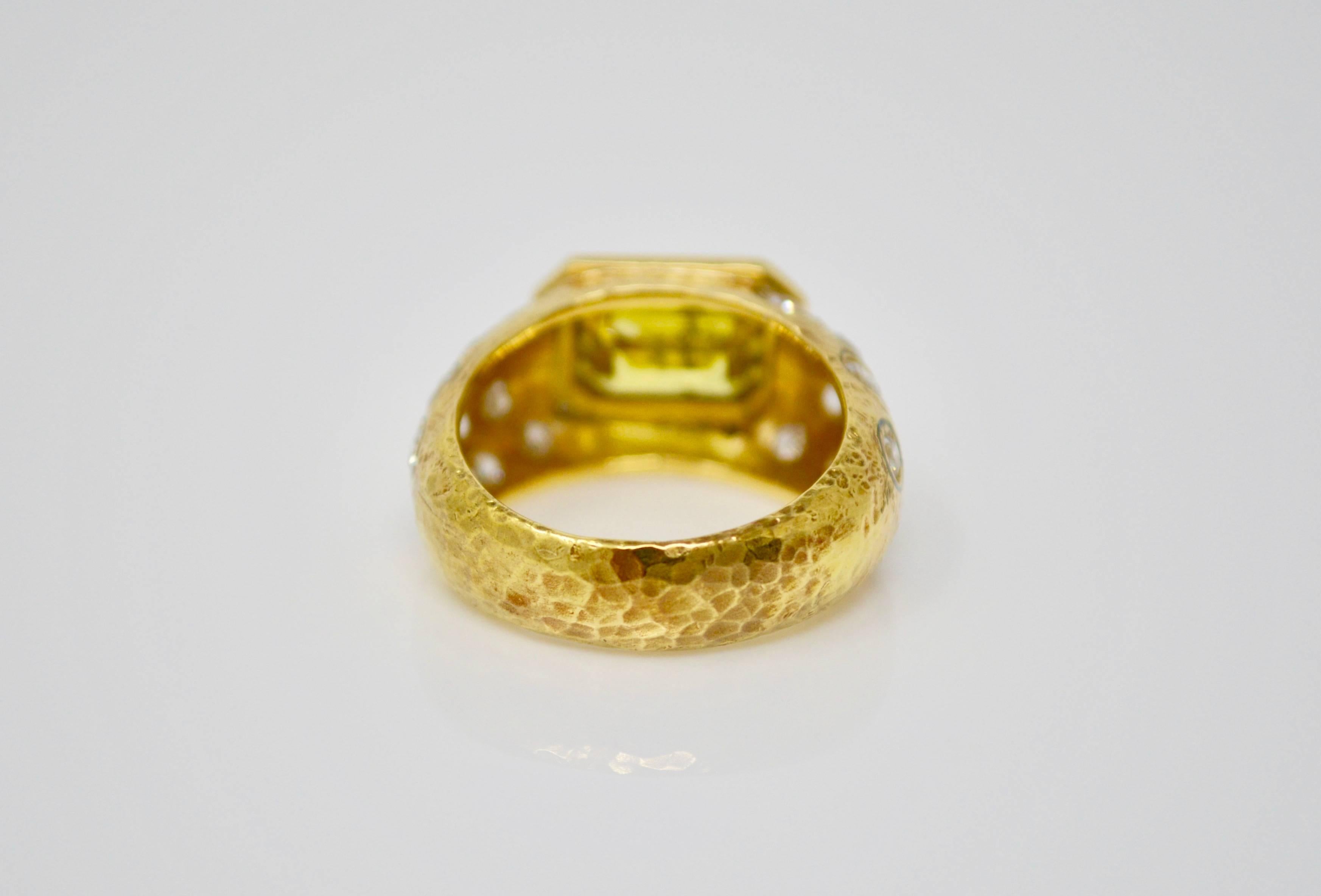 This stunning ring features a fancy deep brown yellow emerald cut diamond weighing 2.86 carat GIA certified. The ring is beautifully hand crafted in 18k yellow gold set with small white diamond to the gallery. 