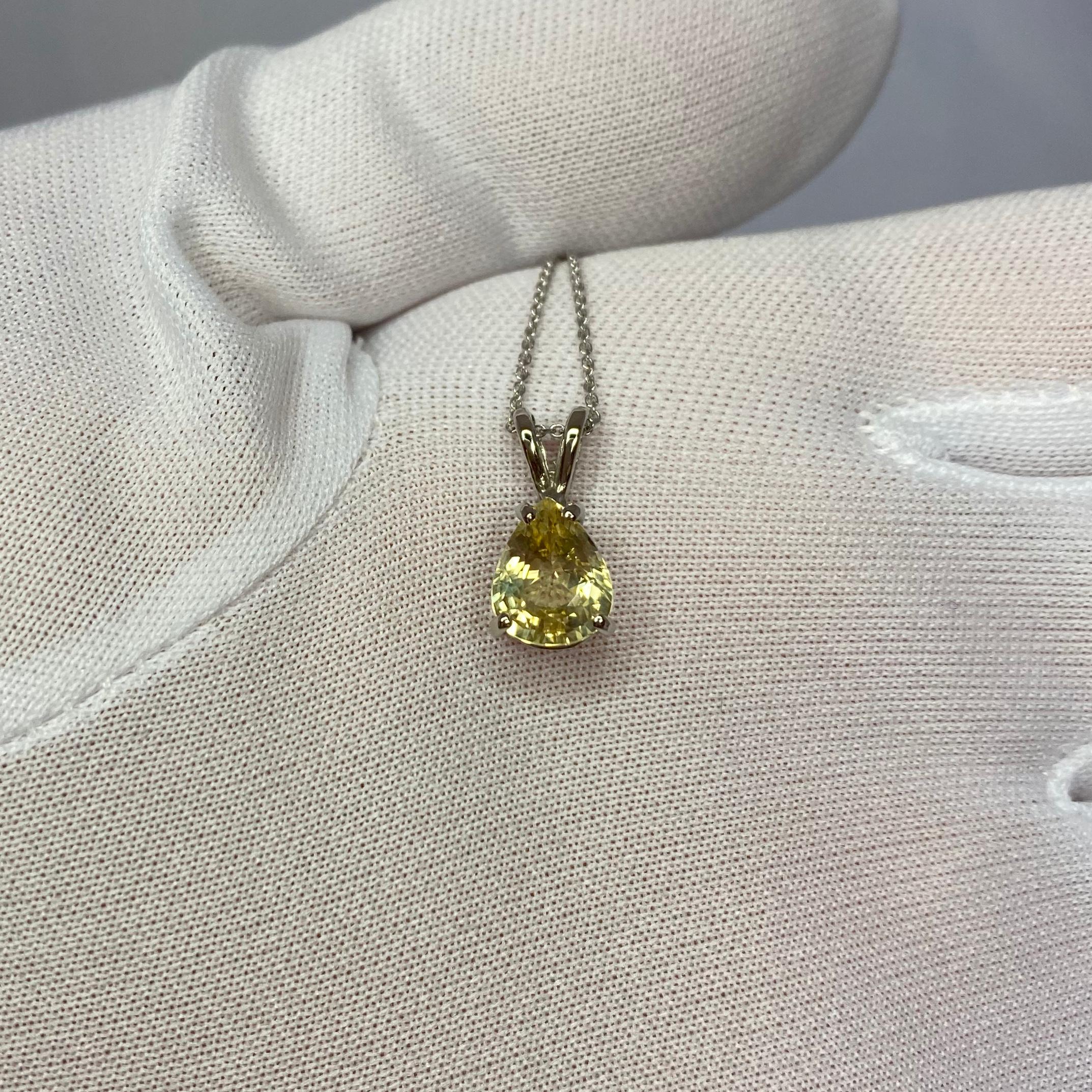 Natural bright yellow untreated Ceylon sapphire white gold pendant. 
2.13 Carat pear cut Sapphire with a stunning colour and excellent clarity. Very clean stone.

It also has an excellent cut and polish to show lots of brightness and light return.