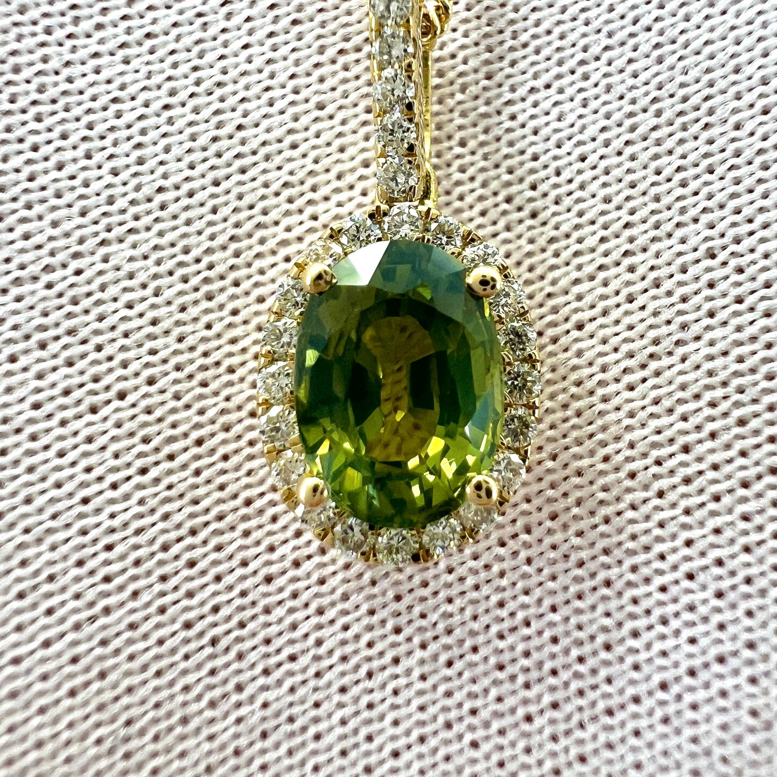 Natural Vivid Green Oval Cut Untreated Sapphire And Diamond 18k Yellow Gold Halo Pendant. 1.35 Total carat.

1.22 Carat GIA certified natural sapphire with a fine vivid yellow green colour and an excellent oval cut.
This sapphire also has excellent