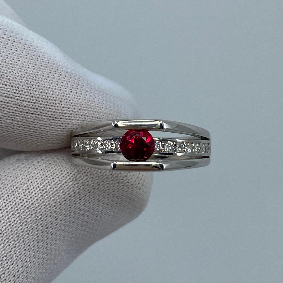 Untreated Ruby & Diamond Platinum Modern Ring.

0.47 Carat ruby with a fine vivid deep red colour. Certified by GIA confirming stone as untreated, very rare for natural rubies.
Also has an excellent round cut and excellent clarity, very clean