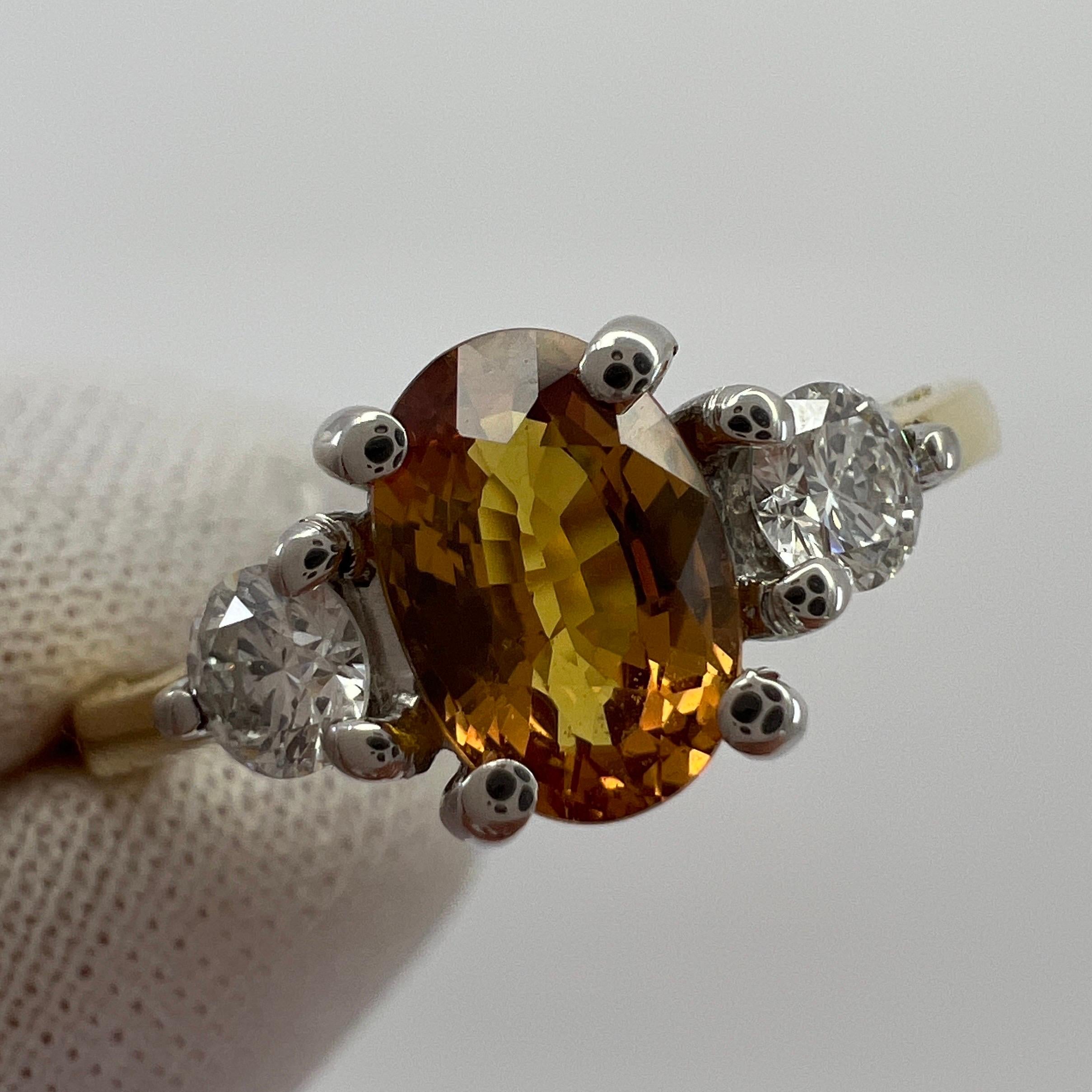 Oval Cut GIA Certified Untreated Orange Sapphire & Diamond Three Stone 18k Gold Ring For Sale