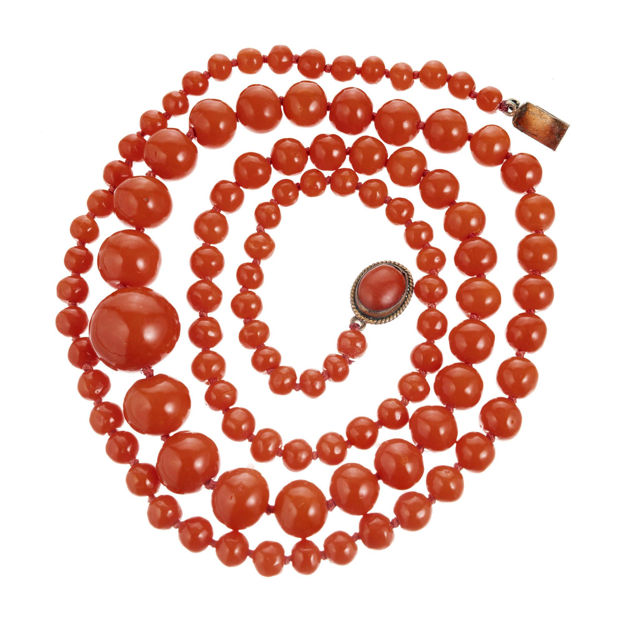 Victorian 1900's all natural orange color well polished Coral necklace. GIA Certified.

105, 13.9 to 5.6mm orange natural color well polished Coral beads. No Dye detected. GIA certificate#2155011.
Yellow metal catch with 9 x 7mm oval natural