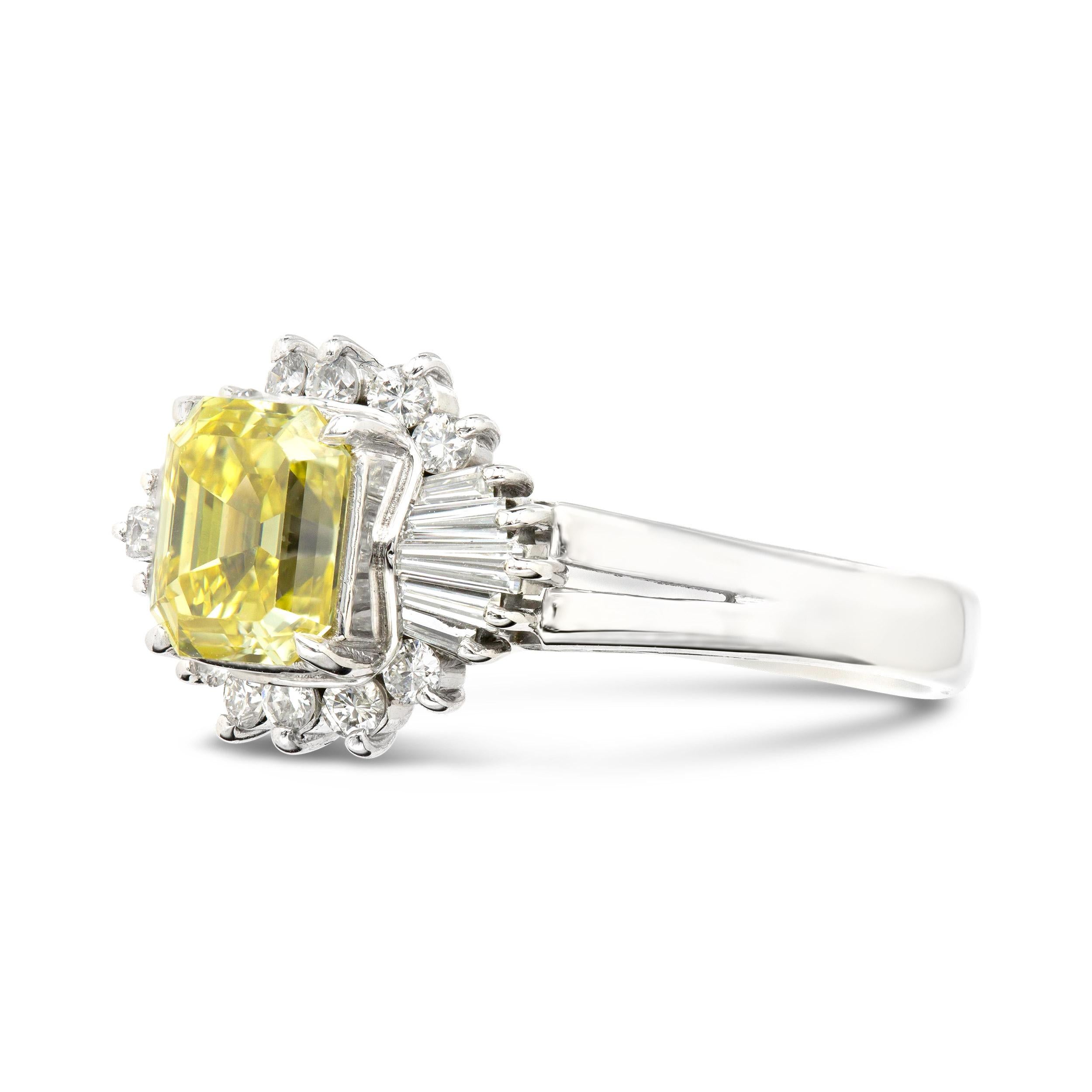 We love a pop of color, especially from a vivid and bright fancy colored diamond. The center GIA certified Emerald Cut, graded fancy intense yellow, shines among a cluster of icy white diamonds. A beautiful ballerina ring that is both elegant and
