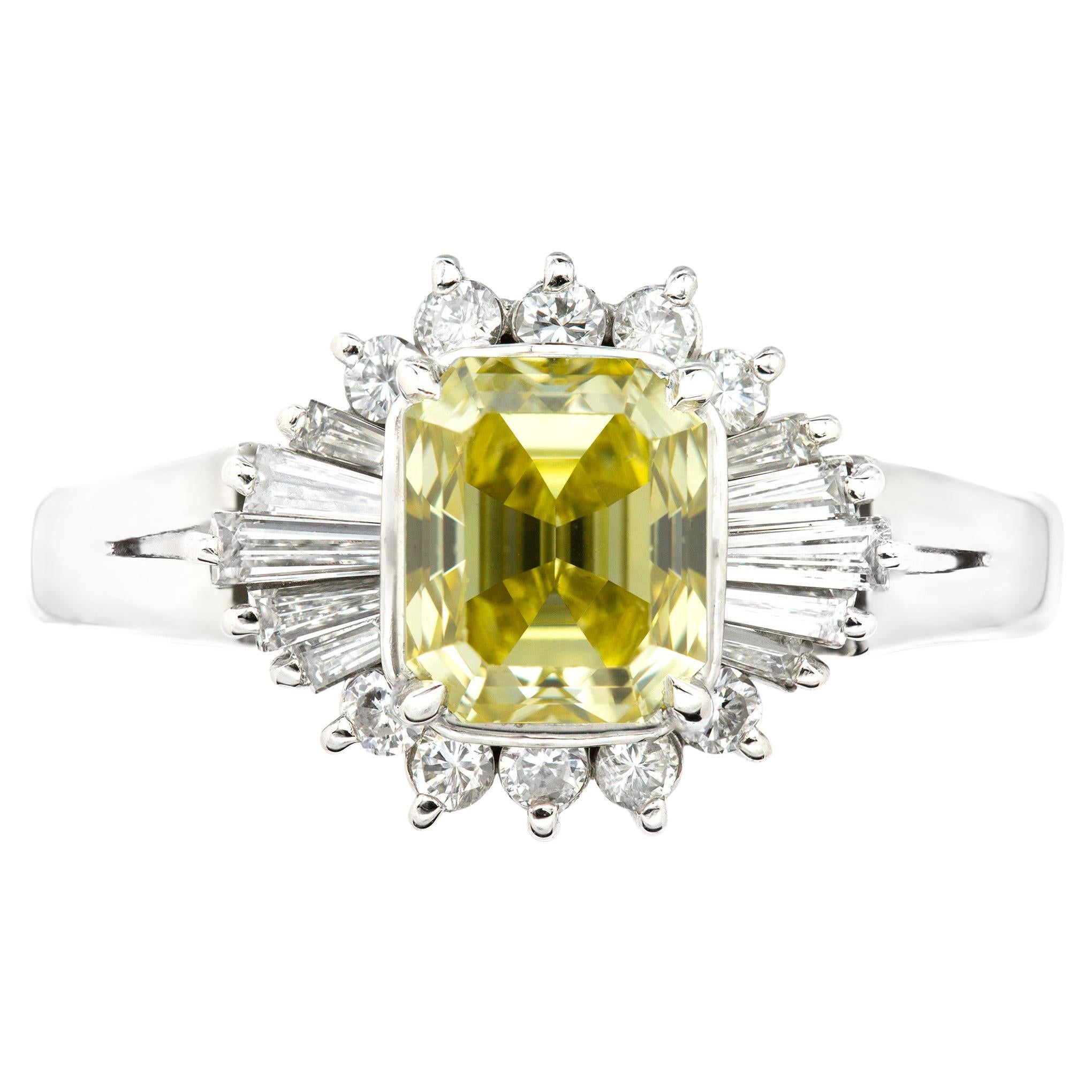 GIA Certified Vintage 1.21 Ct. Fancy Intense Yellow Emerald Cut Ballerina Ring For Sale