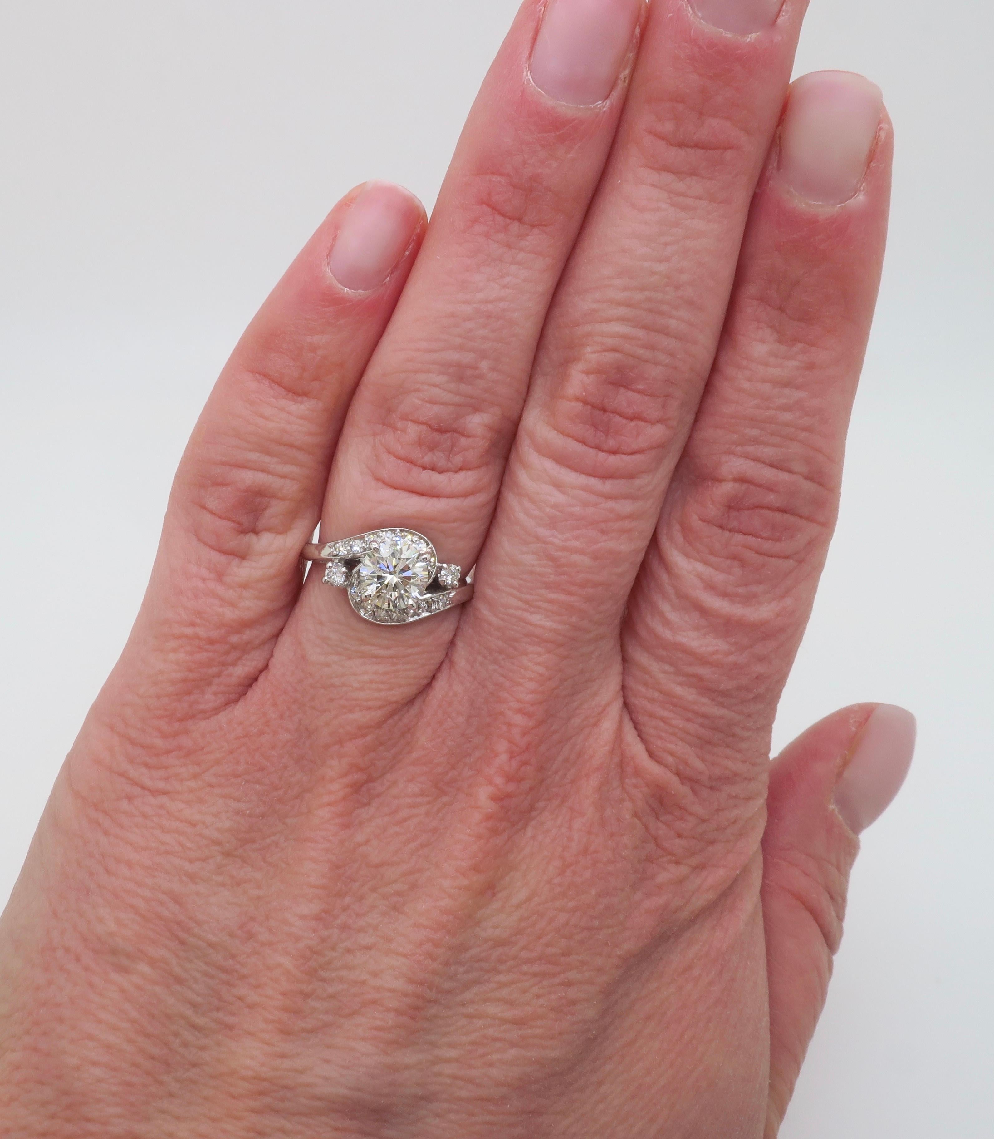 GIA Certified 1.48CTW vintage diamond ring crafted in 14k white gold. 

Center Diamond Carat Weight: 1.17CT Earth Mined
Center Diamond Cut: Round Brilliant Cut 
Center Diamond Color: L
Center Diamond Clarity: I1
Center Diamond Certification: GIA: