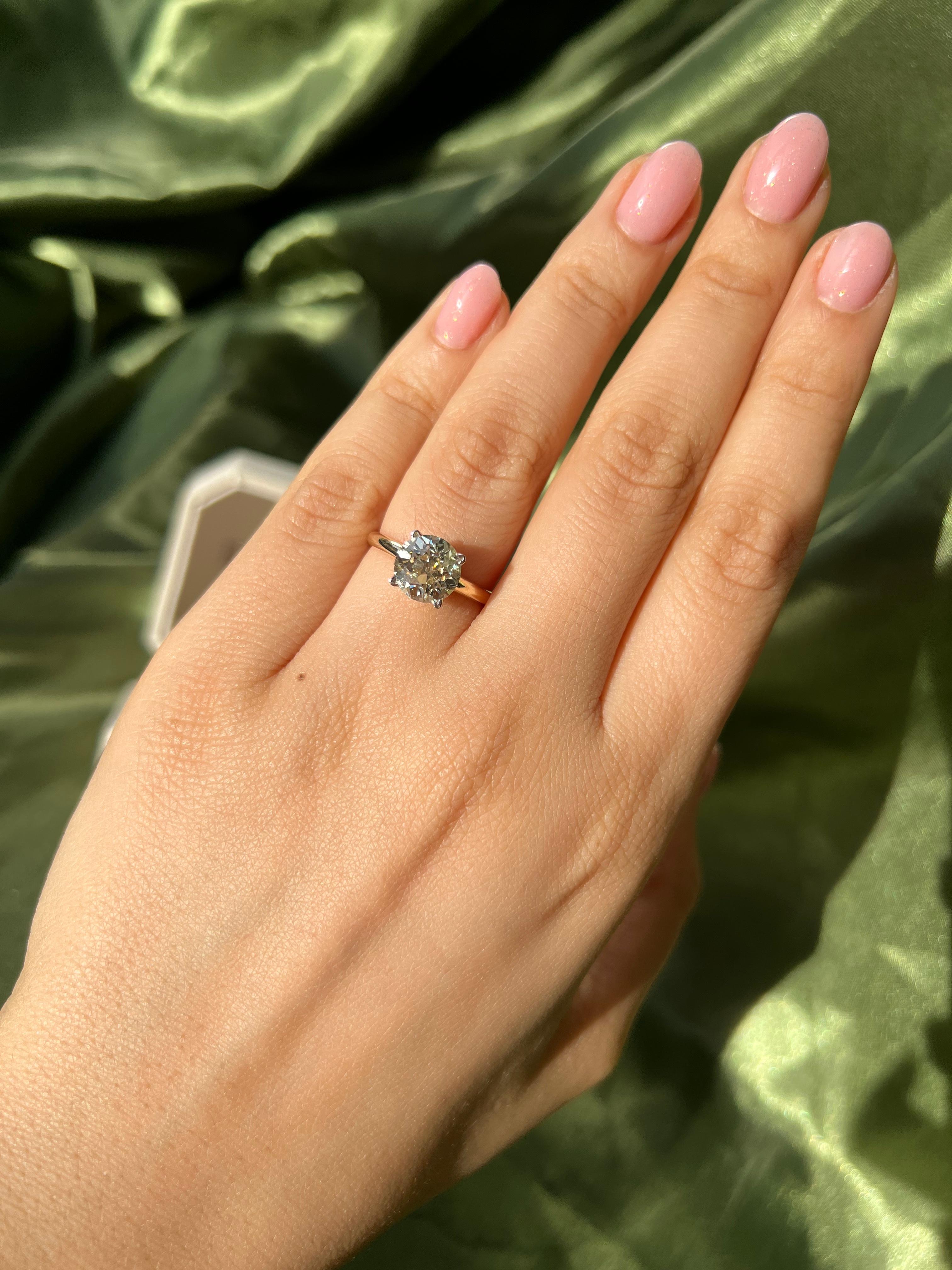 It doesn't get more timeless than this, an elegant diamond on an effortless setting. The center is an incredibly bright 2.65 carat GIA certified old Euro with a beautiful facet pattern and oh-so much sparkle. We love a barely-there four prong looks