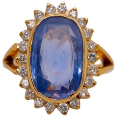 GIA Certified Vintage Ceylon Sapphire Diamond Halo Ring in 14 Karat Yellow Gold