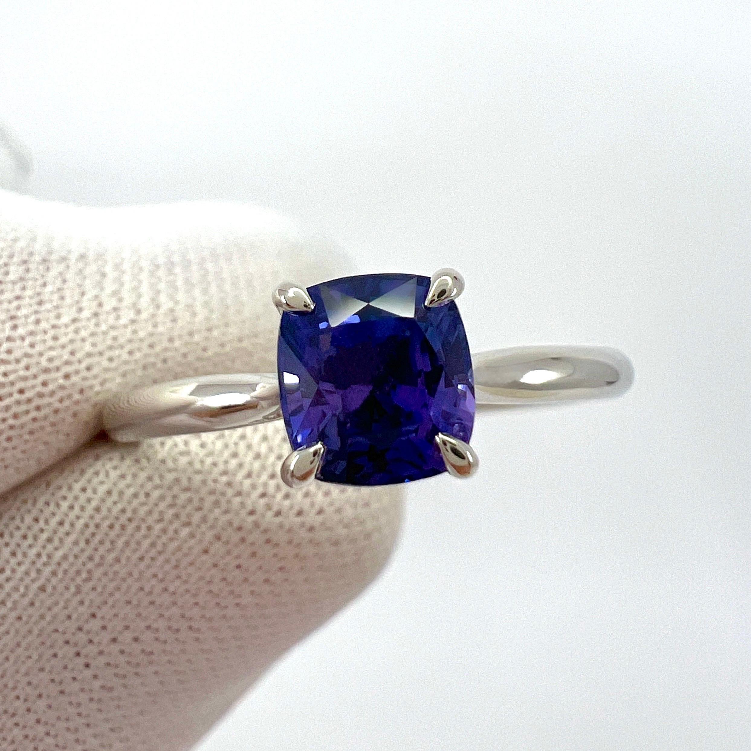 Natural Vivid Violet Blue Cushion Cut Sapphire 18k White Gold Solitaire Ring.

GIA Certified 1.08 carat sapphire with a stunning vivid violetish blue colour and excellent clarity. Very clean stone. VS.
Also has an excellent square cushion cut which
