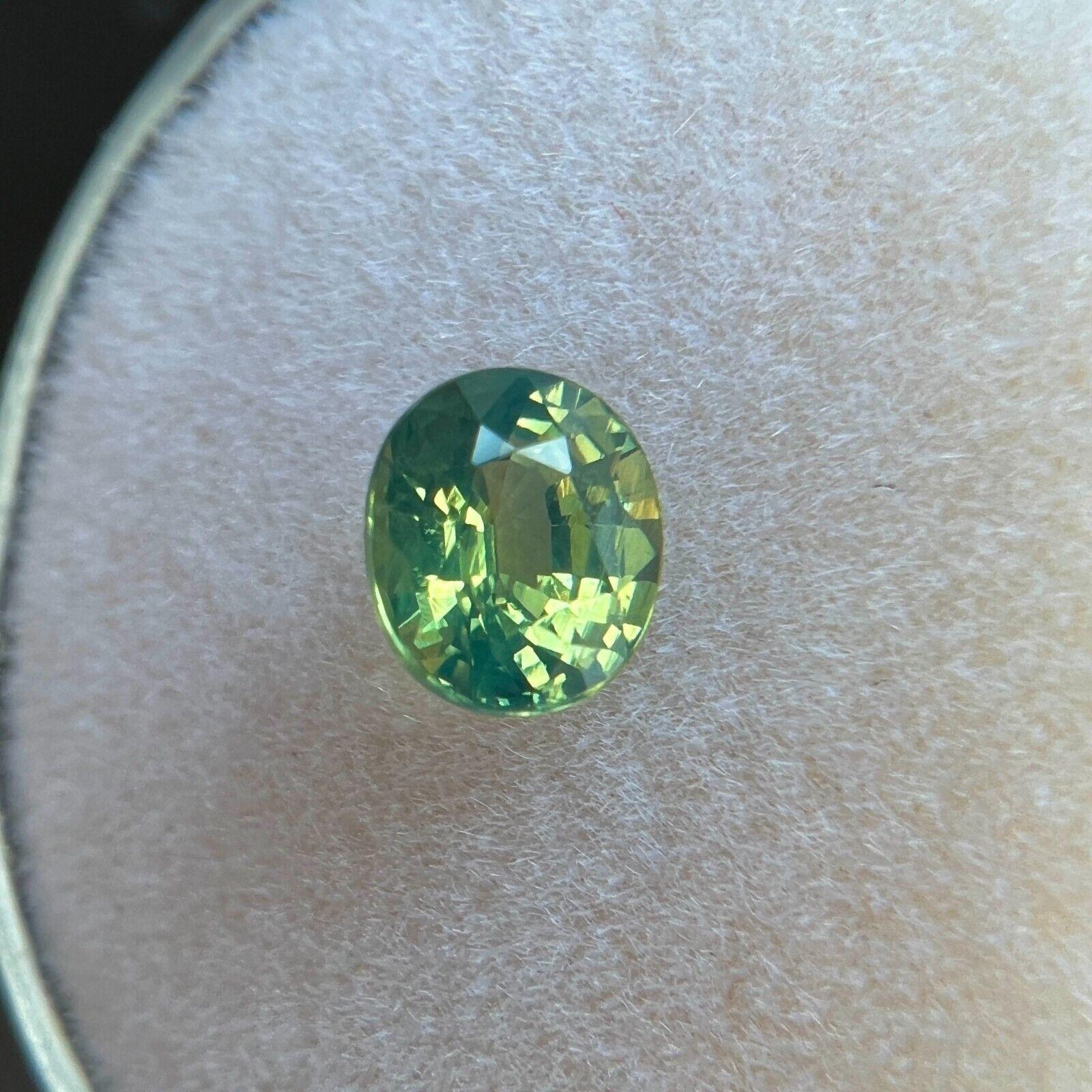 Women's or Men's GIA Certified Vivid Yellow Green Sapphire 0.90Ct Natural Oval Cut Unheated Rare  For Sale