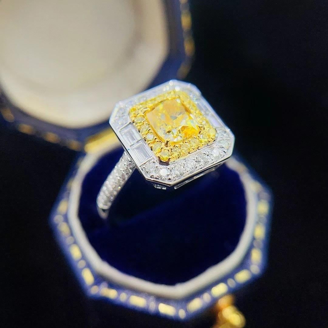 Modern GIA Certified VS1 Clarity 1.01 CT Yellow Diamond Ring with Baguette Diamonds For Sale