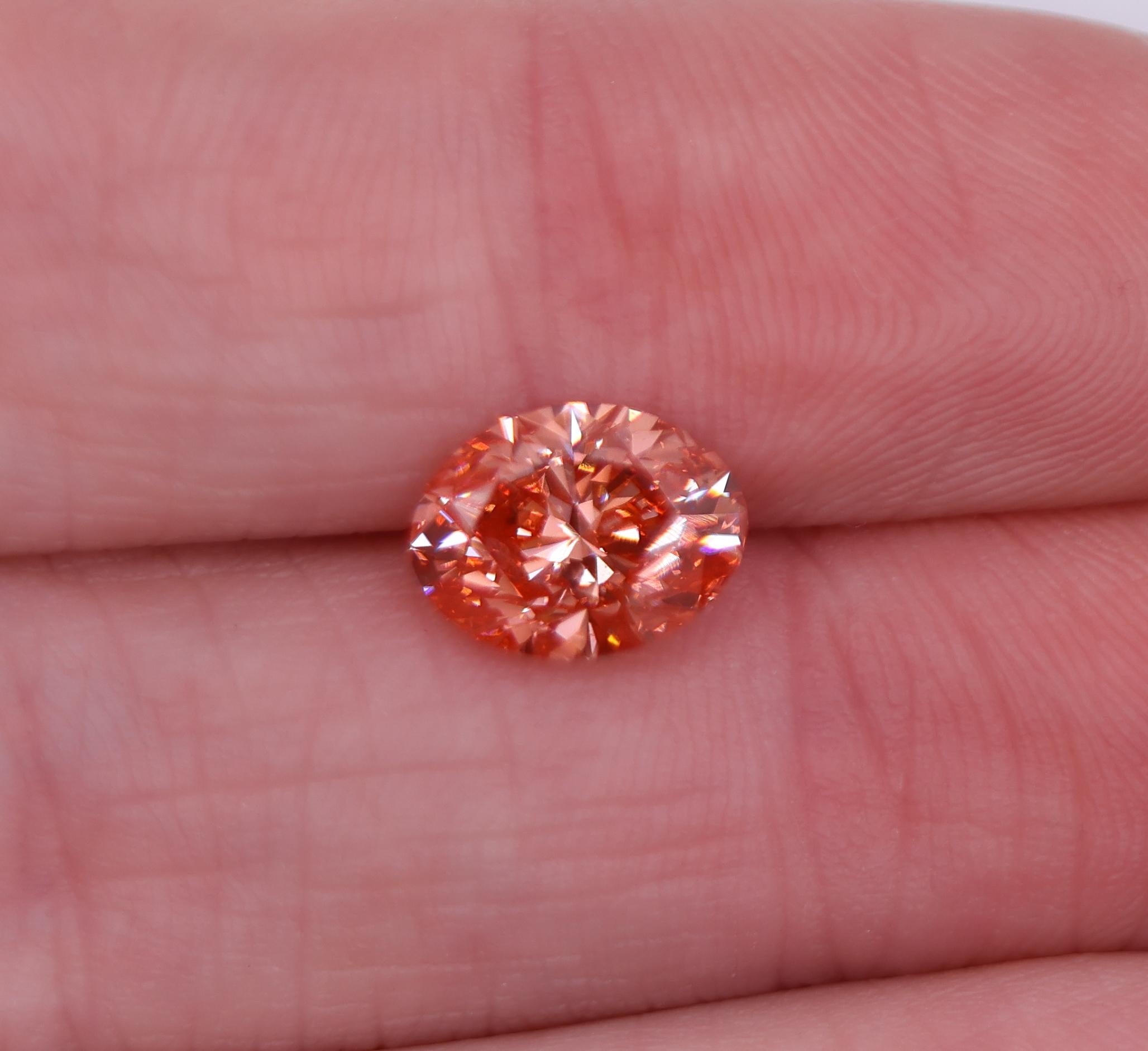 Women's GIA Certified VS2 2 Carat Orangy Pink Earth Mined Diamond Brilliant Oval 9x7mm For Sale