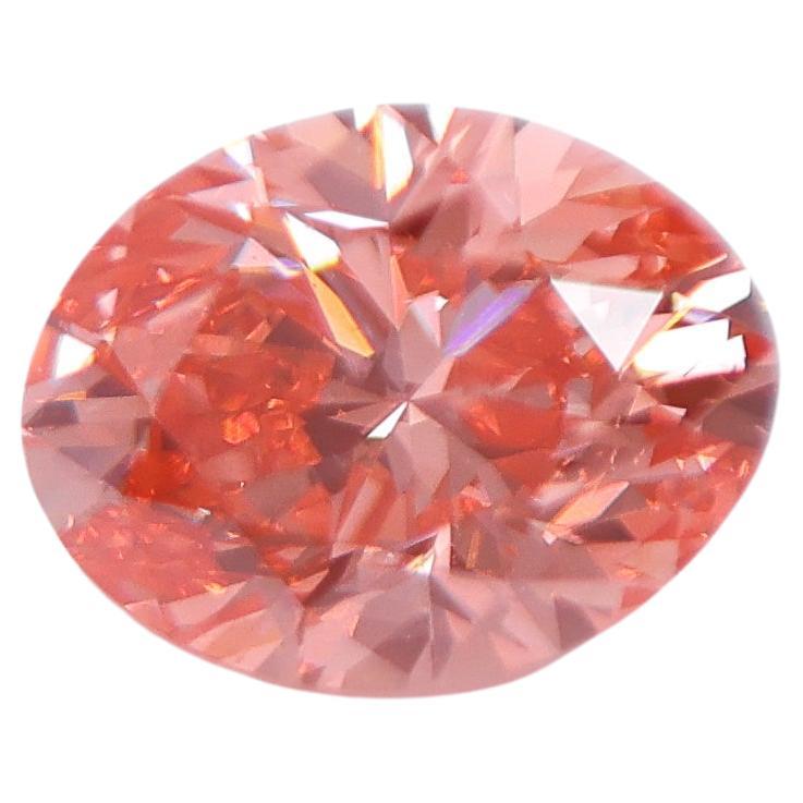 GIA Certified VS2 2 Carat Orangy Pink Earth Mined Diamond Brilliant Oval 9x7mm For Sale