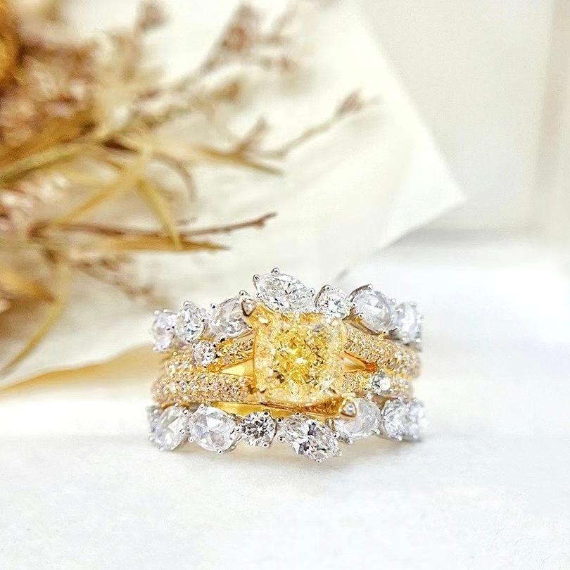 GIA Certified VS2 Clarity 1.51 CT Yellow Diamond 18K Yellow Gold Ring

GIA Certified 1.51 CT Fancy Light Yellow  Diamond 
Rose Cut Diamonds - 1.78 CT
Total Weight - 8.25 GM