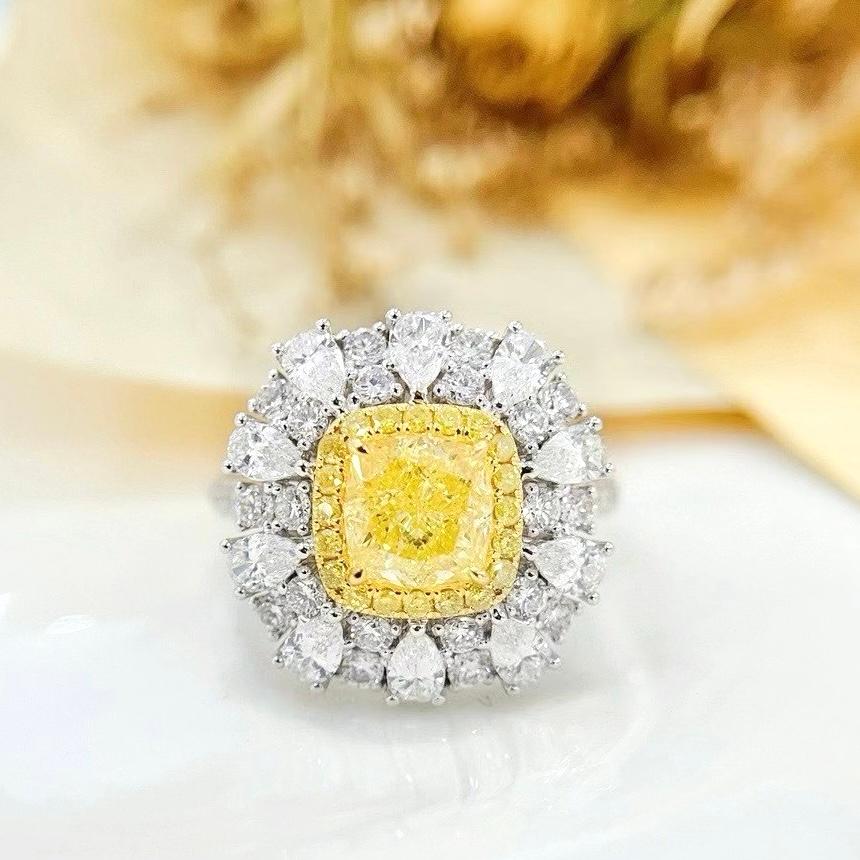 Modern GIA Certified VVS1 1.50 CT Fancy Yellow Diamond Cocktail Ring For Sale