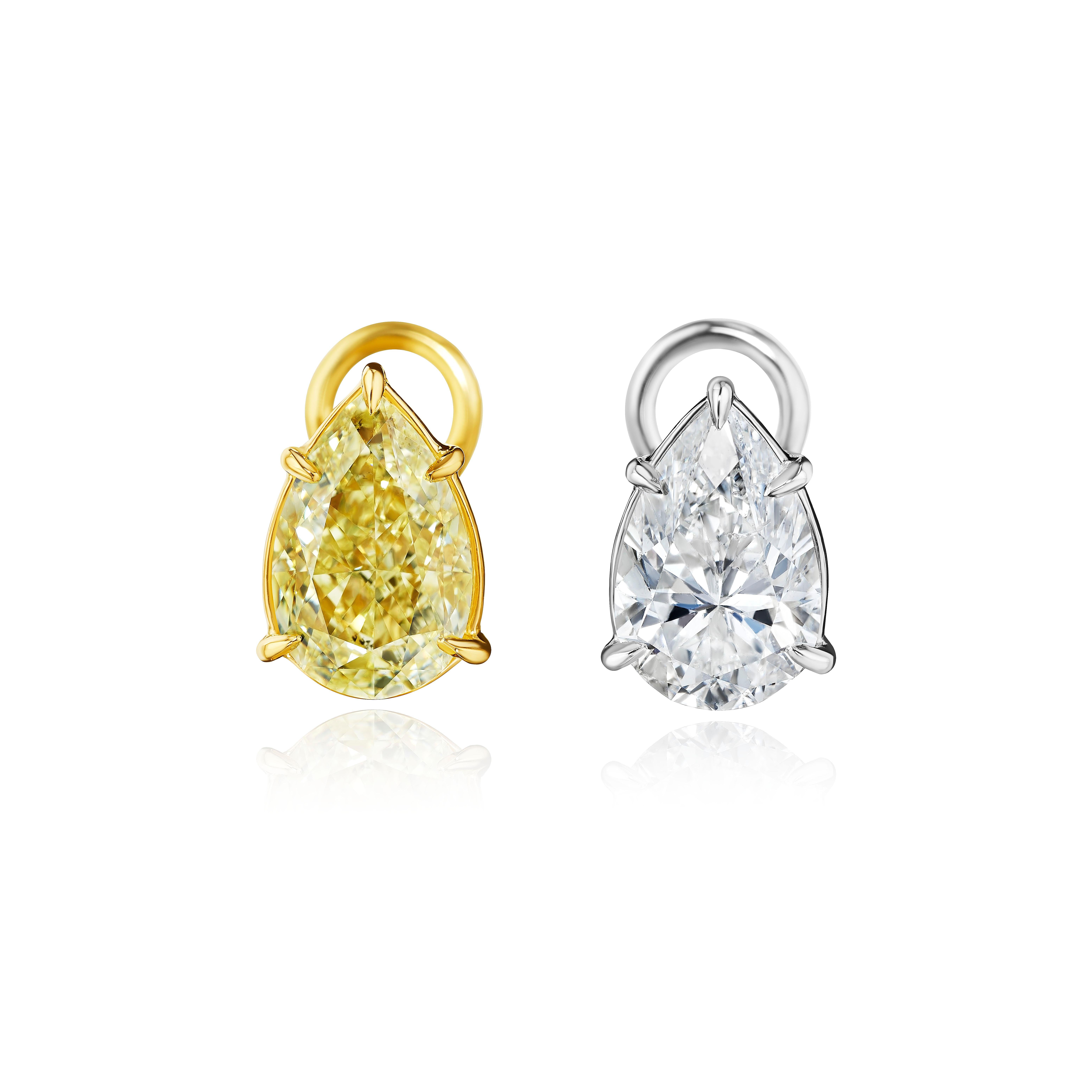 Beautiful Earring featuring a 3 Carat Fancy Light Yellow Diamond and a 2.5 Carat White Diamond.

All Stones will be GIA Certified. Set in Platinum and 18 Karat Yellow Gold.
