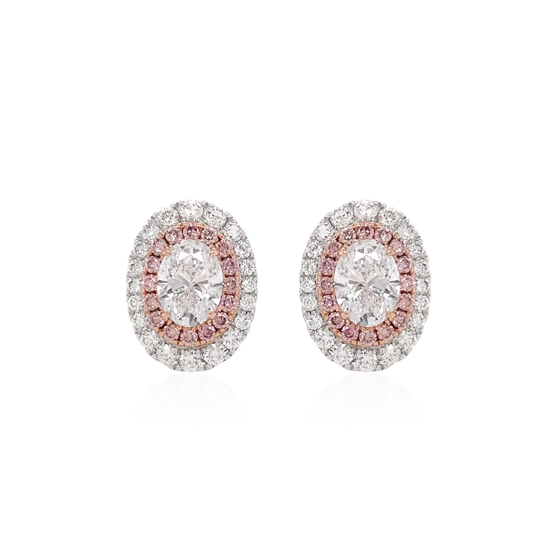 The timeless combination of White Diamond and Argyle Pink Diamond has been re-imagined in these glamorous earrings. Featuring dazzling White Diamonds, surrounded halos of Argyle Pink Diamonds and White Diamonds in this piece, emits a rich hue that