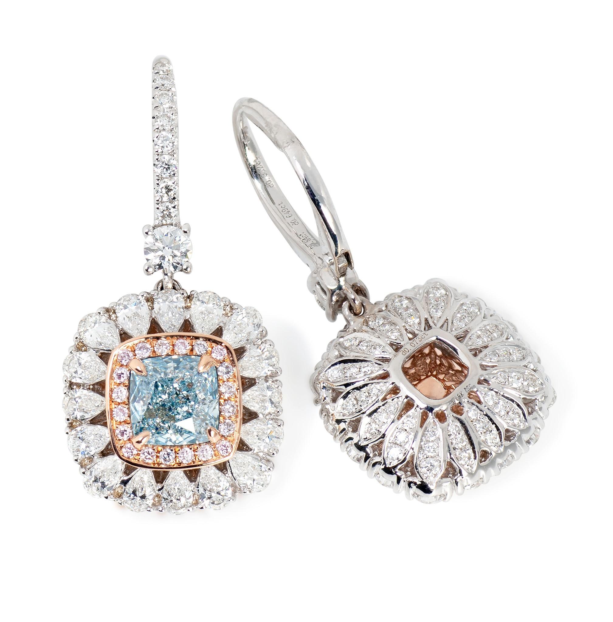 18k White Gold diamond Earrings features 1.70 cts of blue, 0.15 cts of pink and 1.28 cts of white diamonds.

This product comes with a certificate of appraisal
This product will be packaged in a custom box

Composition:
18k white gold
1.70 cts blue