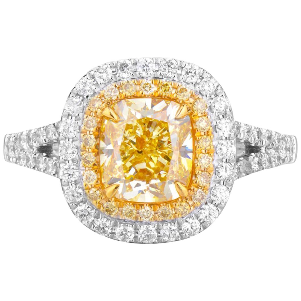 GIA Certified White Gold Cushion Cut Fancy Intense Yellow Diamond Ring - 2.07 ct For Sale