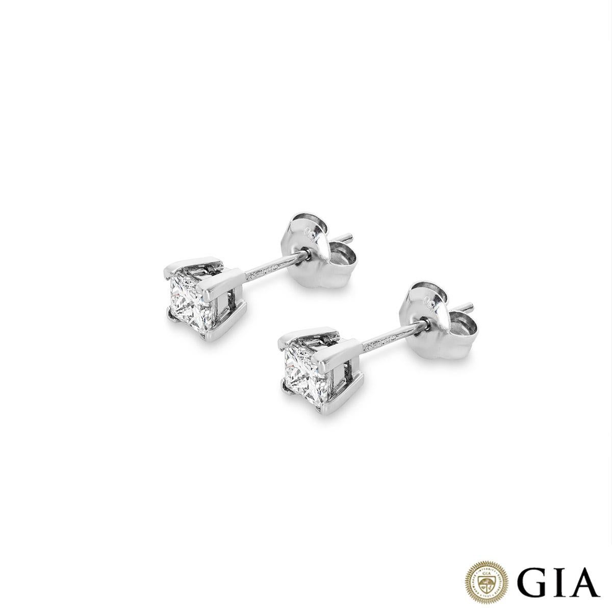 A sparkly pair of 18k white gold diamond earrings. The earrings are set to the centre with a princess cut diamond in a four prong mount. The first diamond weighs 0.50ct, D colour and VVS2 clarity and the second diamond weighs 0.51ct, D colour and