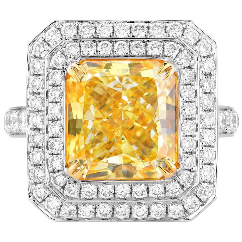 GIA Certified White Gold Radiant Cut Yellow Diamond Ring, 6.01 Carat For Sale