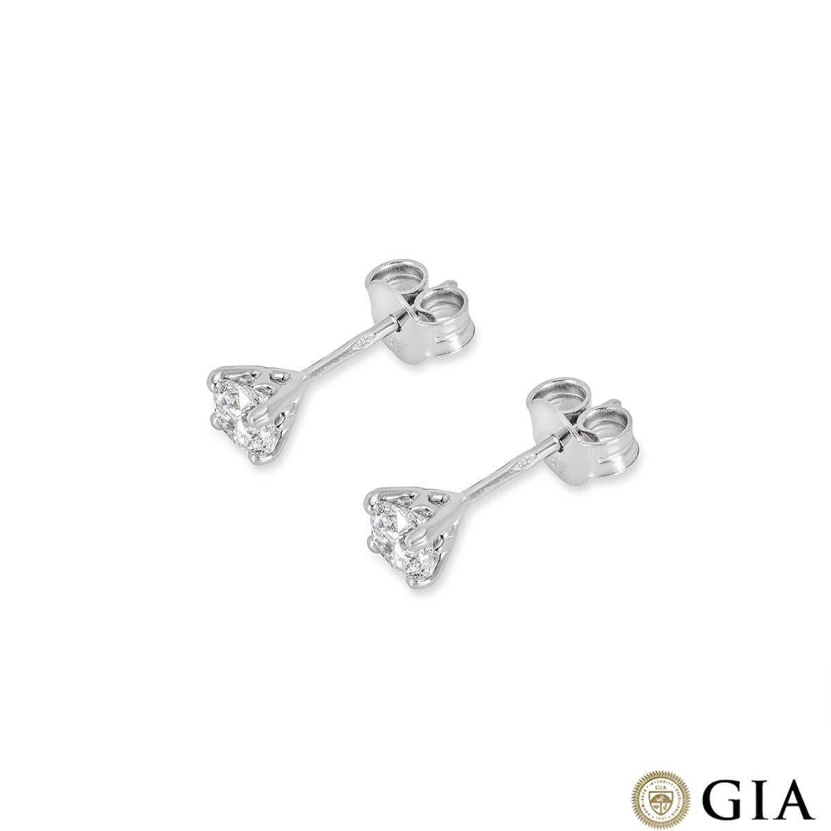 A sparkly pair of 18k white gold diamond stud earrings. The earrings are perfectly matched and feature round brilliant cut diamonds in a 4 claw setting. The diamonds each weigh 0.40ct, are F colour and SI1 clarity. They finish with post and
