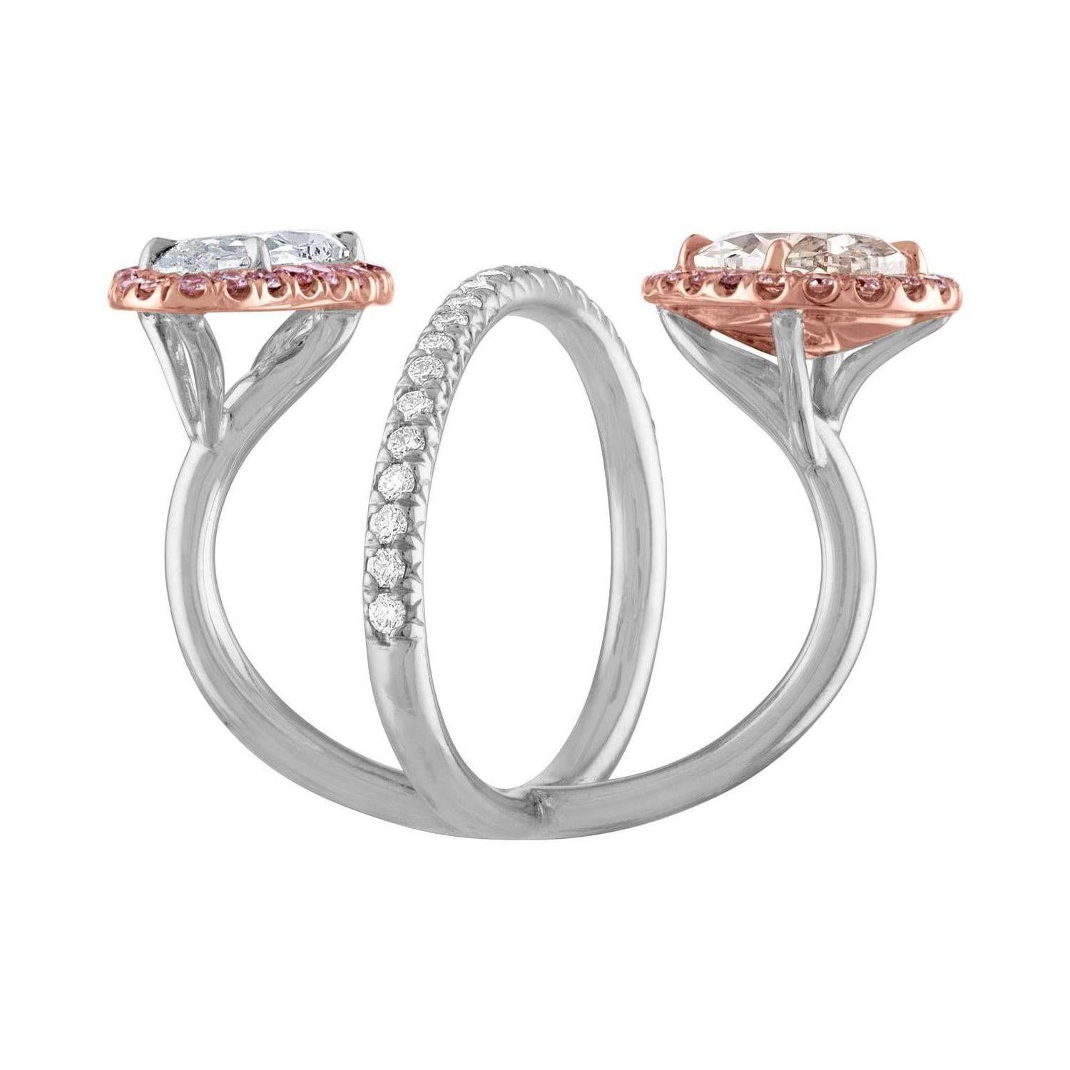 GIA Certified 2.15 Carat Brown-Pink Oval Diamond is set with another 1.55 Carat Oval Diamond, GIA Certified as well.
Both are set in hand crafted Platinum & 18K Rose Gold Mounting.
GIA Certificate number for the 2.15 Carat Oval Diamond is 16238395