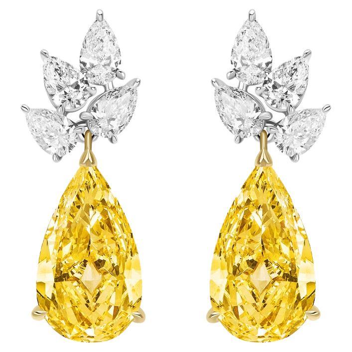 Boucles d'oreilles pendantes composées de diamants jaunes et blancs en forme de poire, certifiées GIA