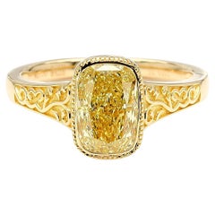 GIA Certified Fancy Yellow 2.02 Carat Diamond Bezel Set Ring in 18K Yellow Gold