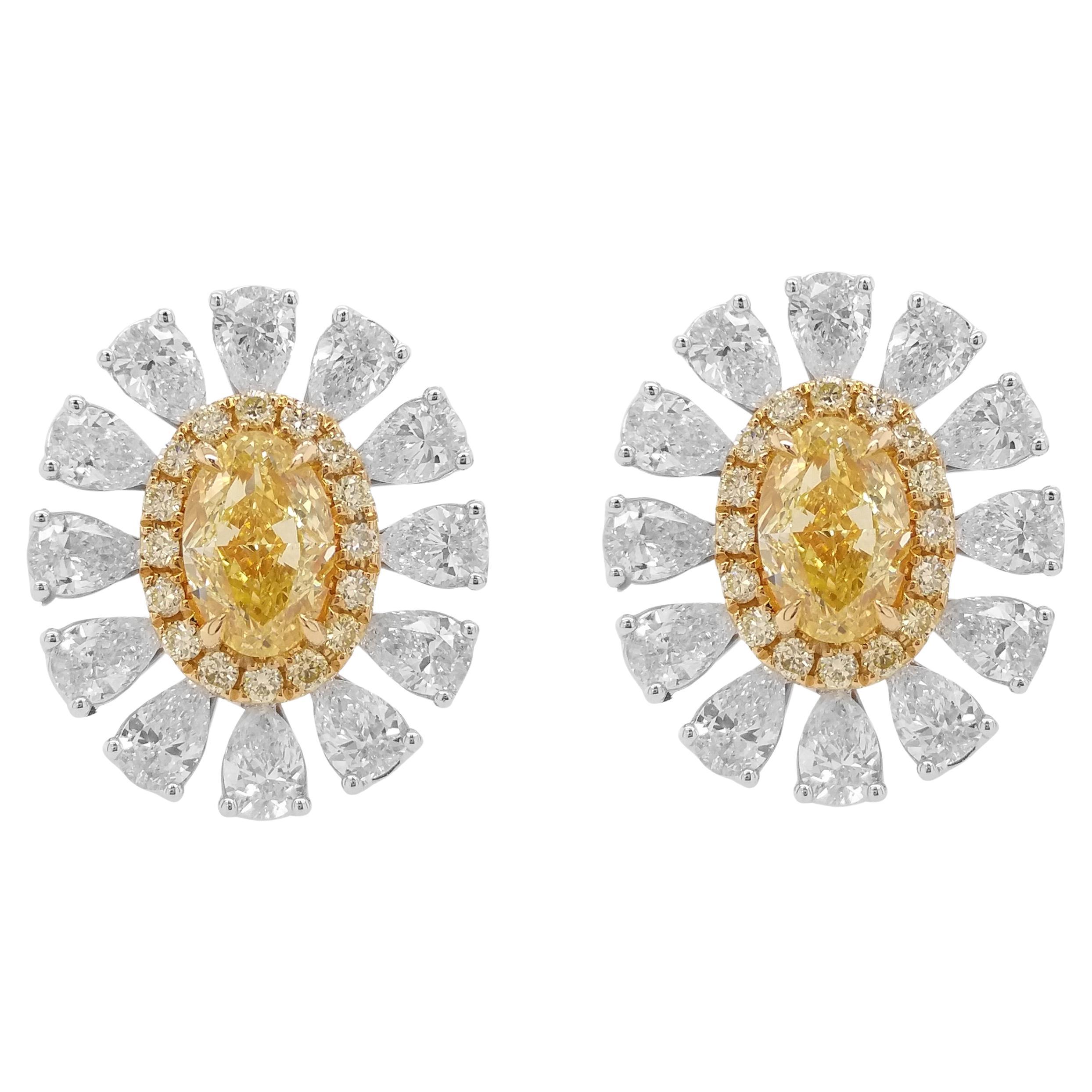 Boucles d'oreilles en or 18 carats avec diamant jaune certifié GIA