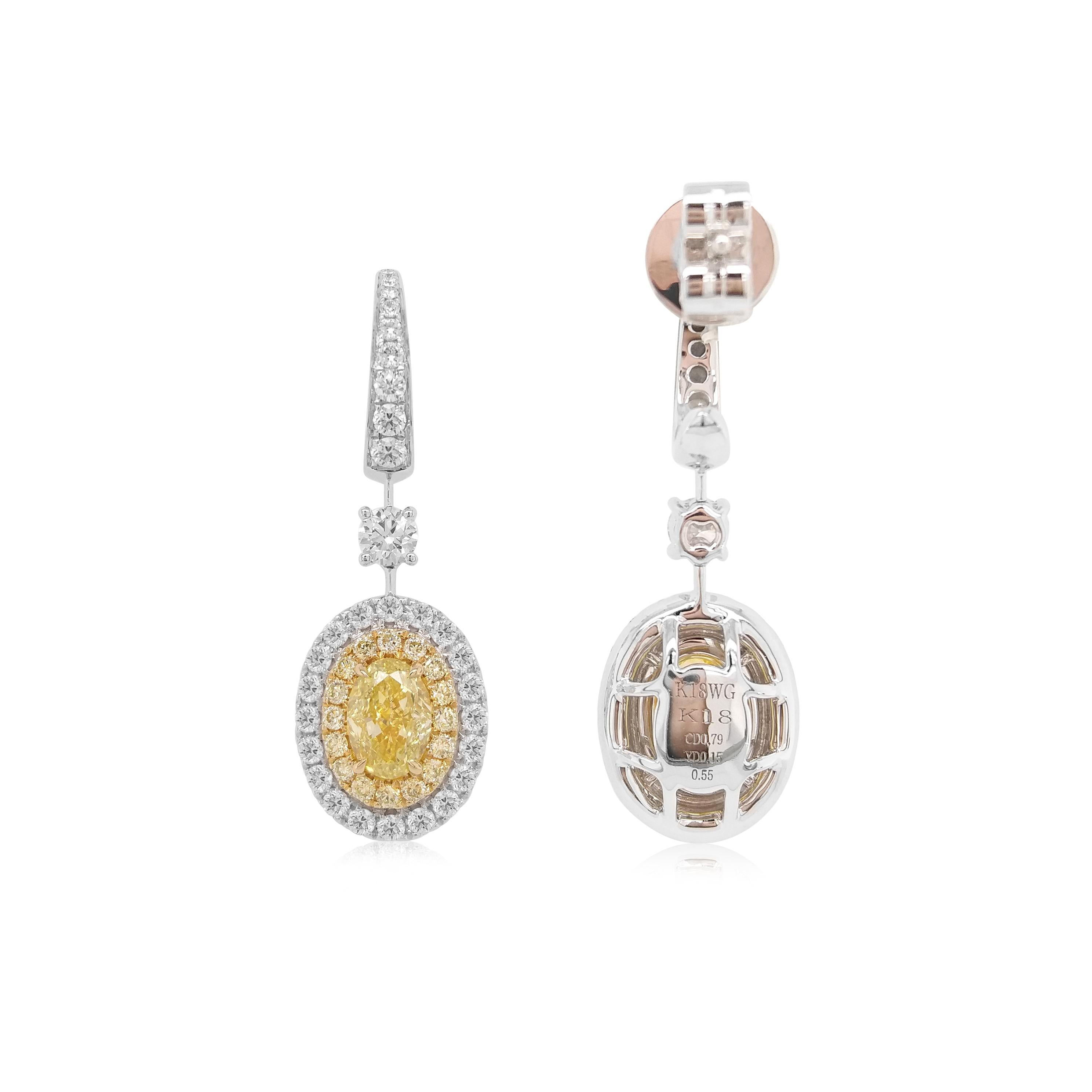 Contemporary GIA Certified Oval Yellow Diamond White Diamond 18K Gold Dangling Earrings For Sale