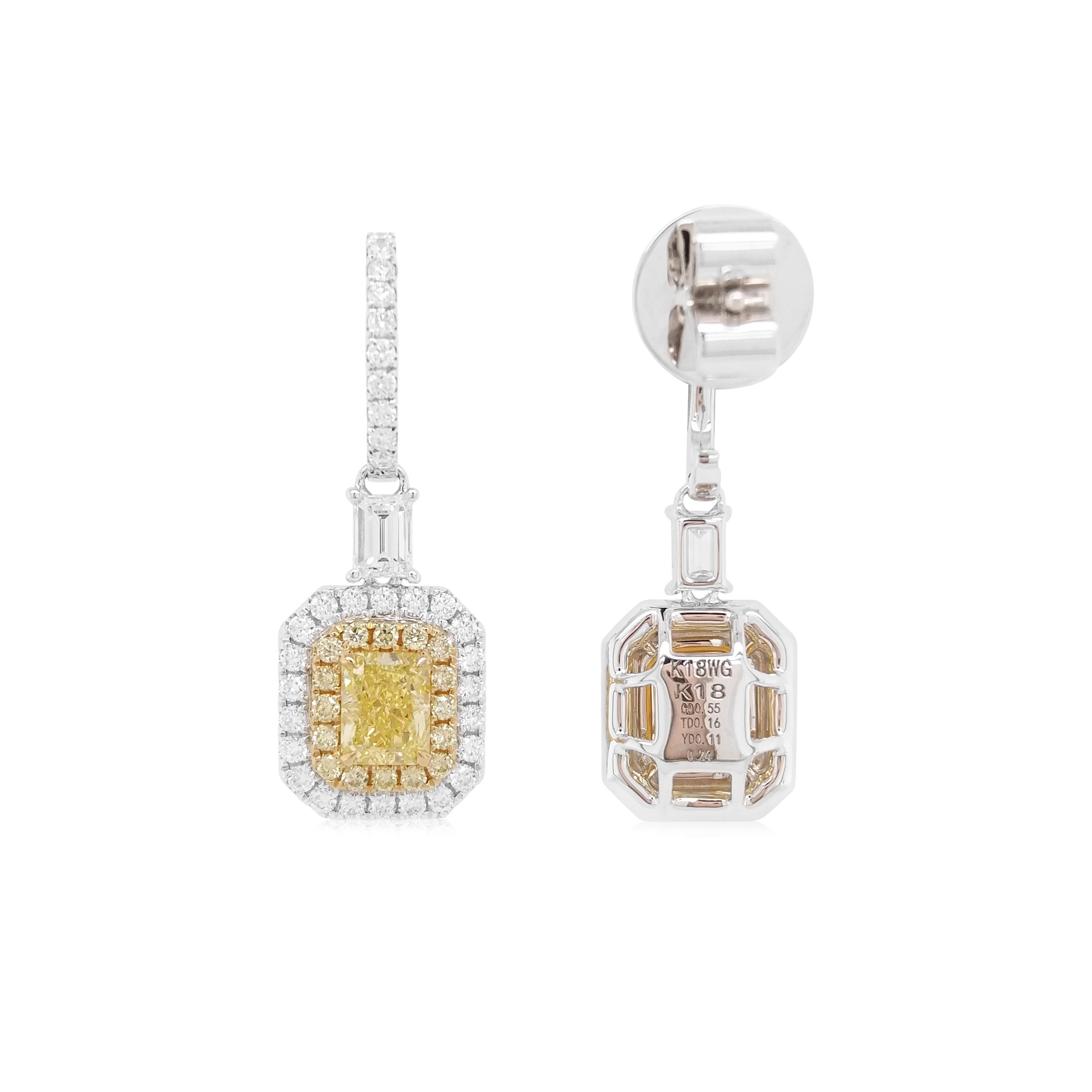Embrace the Festive Spirit with Timeless Luxury! These GIA Certified Yellow Diamond Dangling Earrings are a celebration of exquisite craftsmanship, featuring a vibrant splash of color and impeccable finish. Let your elegance shine brighter this