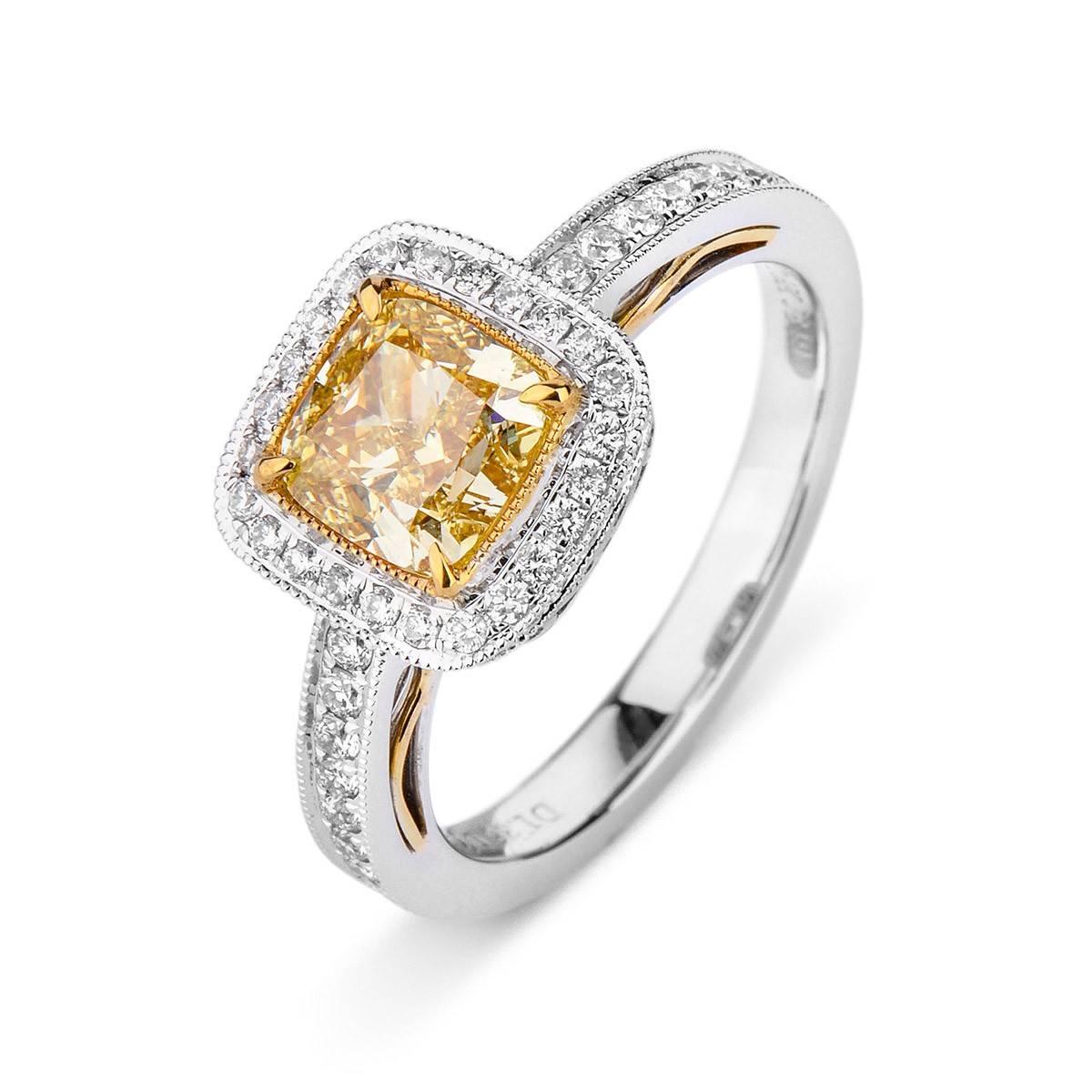 YELLOW DIAMOND RING - 1.78 CT


Set in 18K White gold


Total yellow diamond weight: 1.36 ct
[1 diamond]
Color: Fancy intense yellow
Clarity: VS2

Total white diamond weight: 0.42 ct
[ 66 diamonds ]
Color: G-F
Clarity: VS

Total ring weight: 4.90