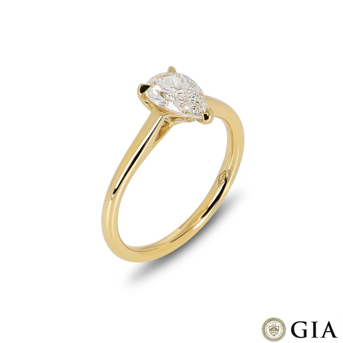 A stunning 18k yellow gold diamond engagement ring. The solitaire ring features a pear cut diamond set to the centre in a three claw mount weighing 0.90ct, F colour and VVS1 clarity. The ring has a gross weight of 2.77 grams and is currently a UK