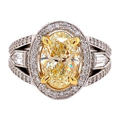 GIA Certified Yellow Oval Shaped Diamond Engagement Ring 3.13 CTTW