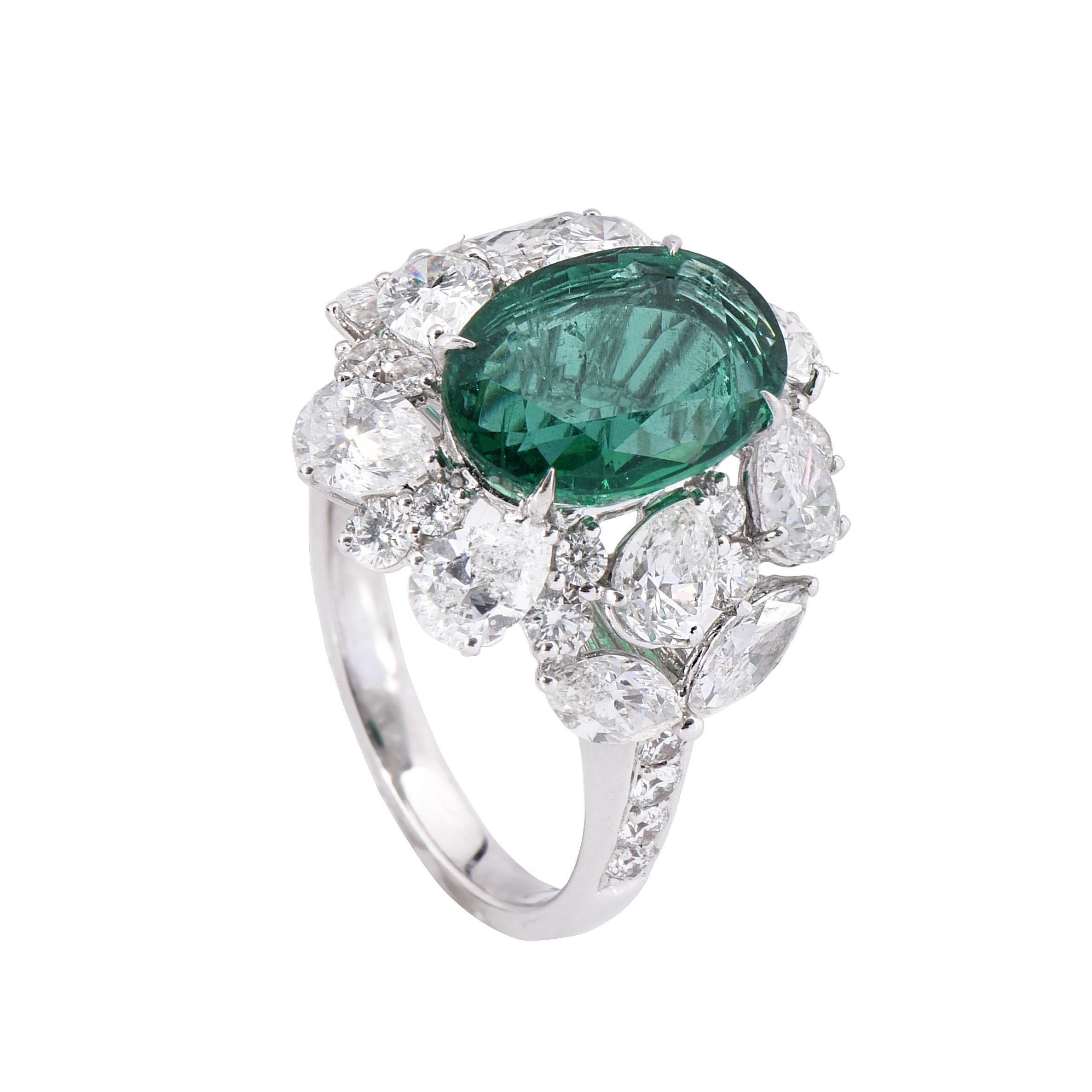 18 karat white gold emerald ring from the Viridian collection of Laviere. The ring is set with a GIA certified 3.44 carats Zambian oval shape emerald, 0.74 carats round brilliant diamonds and 3.11 carats fancy shape diamonds. 
Gold Weight 7.17