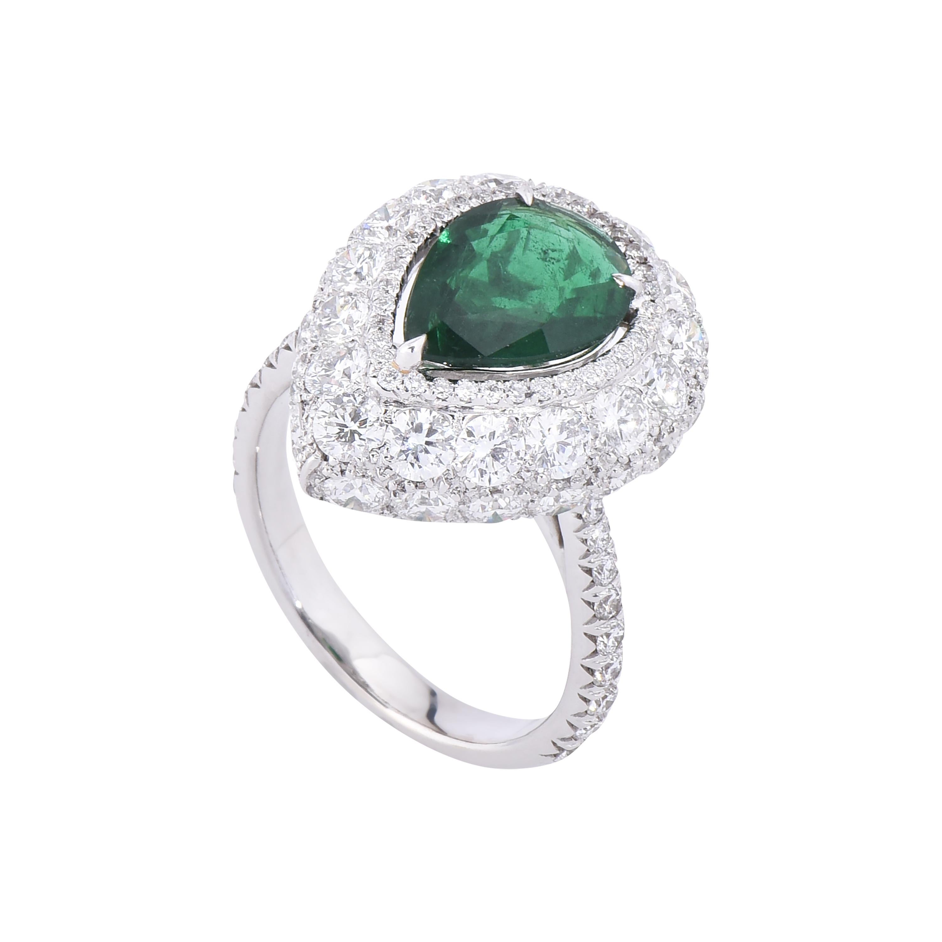A stunning 18 karat white gold emerald ring from the Viridian collection of Laviere. The ring is set with a GIA certified 1.87 carats Zambian pear shape emerald and 3.58 carats round brilliant diamonds.
Gold Weight 7.04 grams. Diamond Clarity VS-SI.