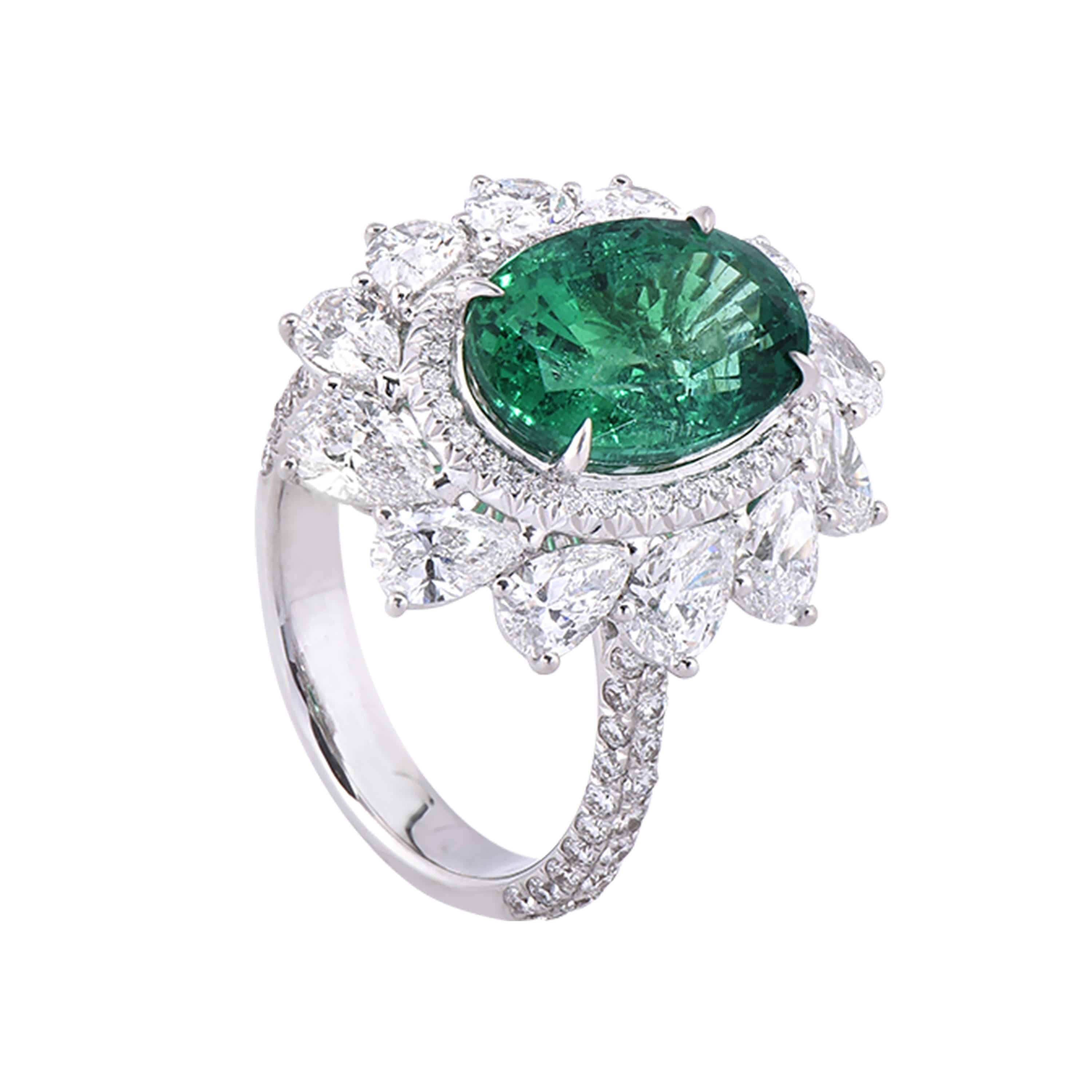 18 karat white gold emerald cocktail ring from the Viridian collection of Laviere. The ring is set with a GIA certified 4.71 carats Zambian oval shape emerald, 2.55 carats brilliant-cut pear shape diamonds and round brilliant diamonds totaling 0.73